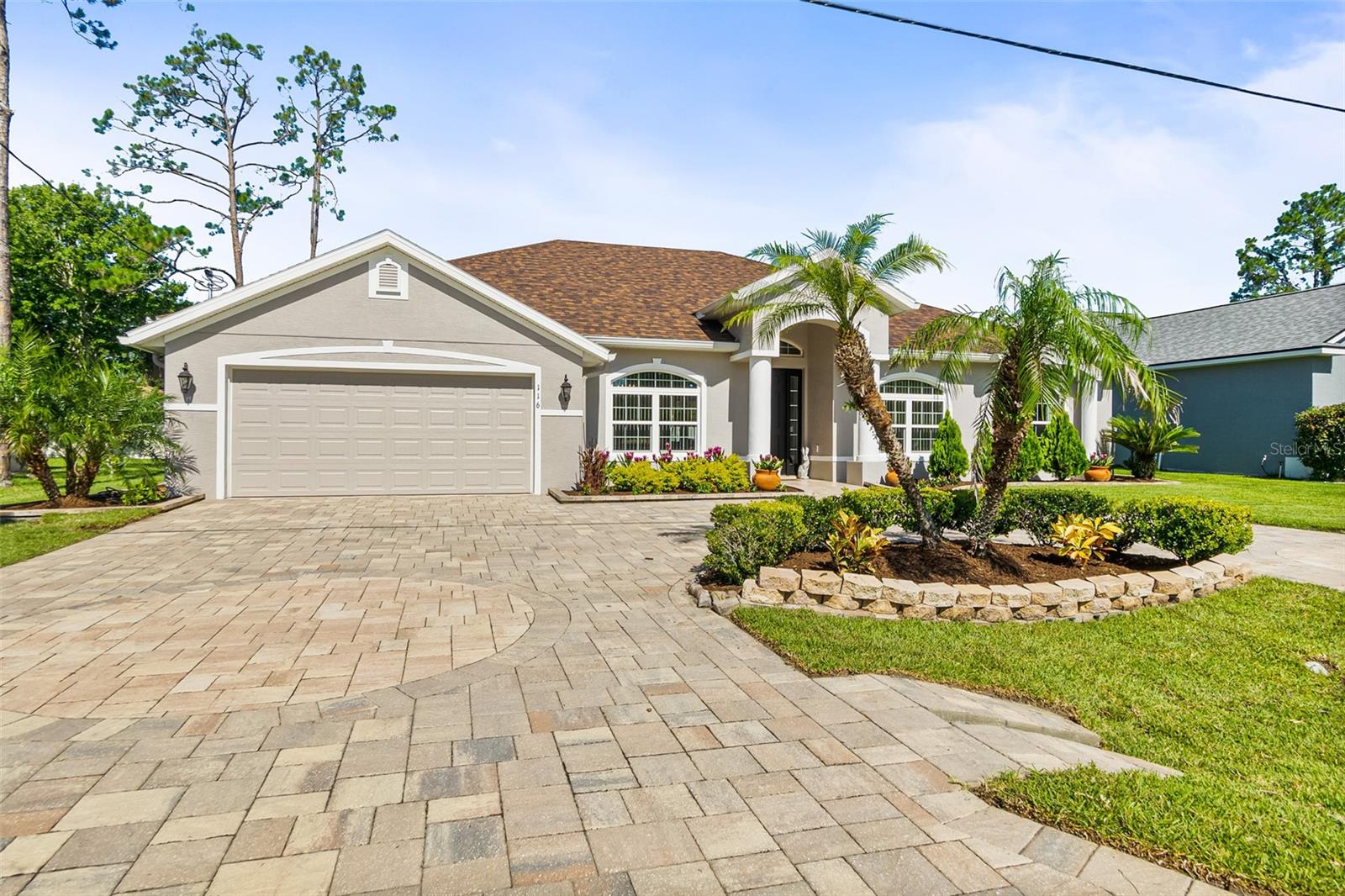 Welcome to 116 Eric Drive, a beautifully updated 4-bedroom, 2-bathroom pool home located in the highly sought-after Cypress Knoll (E Section) of Palm Coast. Built in 2016, this move-in-ready home combines modern upgrades, exceptional outdoor living, and an ideal location just minutes from golf, shopping, dining, and Flagler Beach. Step inside to discover a spacious open-concept floor plan with soaring ceilings, abundant natural light, and a desirable split-bedroom layout that offers both privacy and functionality. Whether you’re hosting family gatherings or enjoying a quiet evening at home, this thoughtfully designed floor plan is perfect for today’s lifestyle. Major updates provide peace of mind, including a new roof (2024), new HVAC system (2025), and fresh interior and exterior paint. Outside, you’ll immediately appreciate the newly enhanced landscaping, creating beautiful curb appeal, along with the impressive circular paver driveway that offers ample parking and an elegant first impression. The backyard is where this home truly shines. Escape to your own private Florida retreat featuring a fully fenced yard and a stunning custom swimming pool completed in 2026, professionally designed with elegant natural stone accents and premium travertine decking. Whether you’re entertaining guests, enjoying weekend barbecues, or simply relaxing in the Florida sunshine, this outdoor oasis was built for year-round enjoyment. Located in one of Palm Coast’s most desirable neighborhoods, you’ll enjoy convenient access to Cypress Knoll Golf Club, parks, walking and biking trails, highly rated schools, shopping, restaurants, medical facilities, and the beautiful beaches of Flagler County—all while being just a short drive to I-95 for easy commuting. If you’ve been searching for a move-in-ready Palm Coast pool home with today’s most desirable updates, exceptional curb appeal, and resort-style outdoor living, 116 Eric Drive is a home you won’t want to miss. Schedule your private showing today and experience everything this exceptional home has to offer.