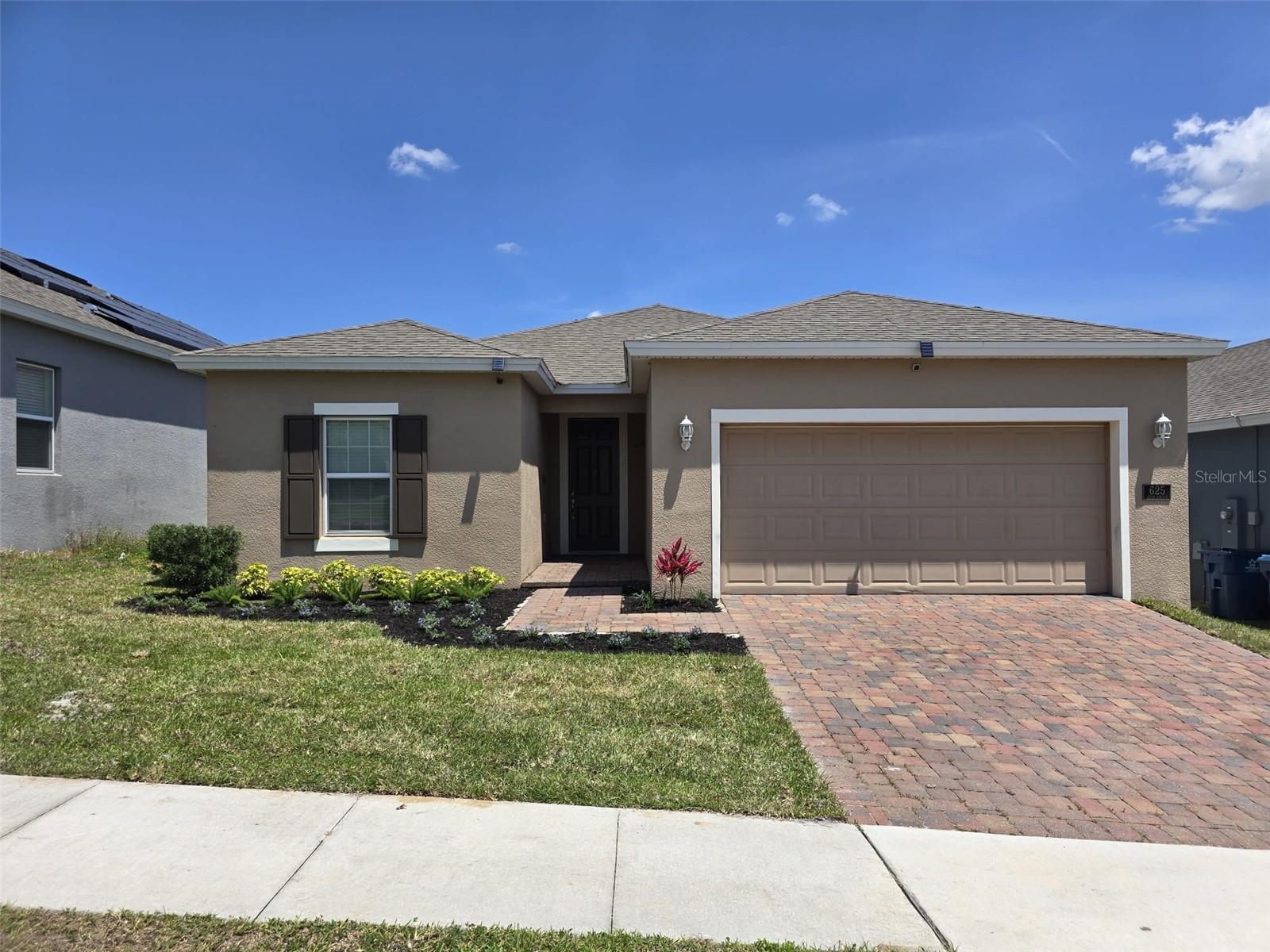Welcome to this beautifully upgraded 4-bedroom, 2-bath home in the heart of Davenport! Enjoy the benefits of LOW HOA fees and a family-friendly community featuring a POOL & PLAYGROUND. Inside, you'll find thoughtful upgrades throughout NEW FLOORING, LIGHTING, CEILING FANS & CABITNETS. Other features included are a water filtration system, modern finishes and an energy-efficient solar system  to help keep your utility costs low. Also there is NEW SOD, LANDSCAPE & AN UPDATED IRRIGATION SYSTEM added. Perfectly situated near the hospital, top-rated restaurants, public parks, and world-famous amusement parks, this home offers the ultimate in convenience and lifestyle. Whether you're looking for your forever home or a fantastic investment opportunity, this property checks all the boxes. Don't miss out—schedule your private showing today!