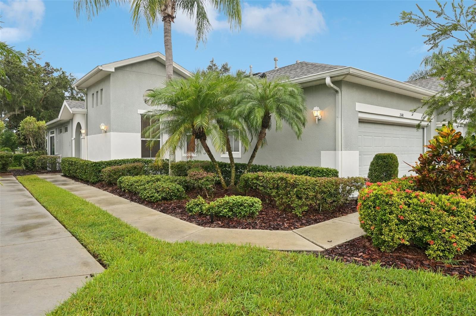 Virtually Staged. Virtually Staged. Back on the market due to buyer health issue. Your search for the perfect Florida home ends here! Nestled within the vibrant, GUARD-GATED 55+ COMMUNITY of Kings Point in Sun City Center, this beautifully maintained 3-bedroom, 2-full-bathroom condo offers a rare combination of space, privacy, and unparalleled amenities. As you enter, you’ll be greeted by a wonderfully light and bright interior, enhanced by an OPEN FLOOR PLAN and dramatic VAULTED CEILINGS that create a sense of airy spaciousness. The heart of this home is the inviting living area, overlooked by a kitchen with a convenient breakfast bar. Home chefs will love the efficiency of NATURAL GAS APPLIANCES, including the range, water heater, furnace, and dryer connection. The intelligent SPLIT-BEDROOM DESIGN ensures a private retreat for the primary suite while offering comfortable accommodations for guests. One of the highlights is the EXPANSIVE FLORIDA ROOM, a perfect space to sip your morning coffee or enjoy an evening cocktail while appreciating the PRIVATE BACKYARD WITH NO REAR NEIGHBORS. The highly sought-after 2-CAR GARAGE provides ample room for your vehicles and the essential Sun City golf cart. Life in Kings Point is an endless vacation. Forget about chores—YOUR MONTHLY CONDO FEE COVERS CABLE, INTERNET, WATER, SEWER, TRASH, ROOF REPLACEMENT, LANDSCAPING, AND ALL EXTERIOR MAINTENANCE. Instead, spend your days enjoying the world-class, resort-style facilities. You'll have access to TWO IMPRESSIVE CLUBHOUSES with endless social opportunities, FIVE SWIMMING POOLS (three outdoor and two indoor) for year-round enjoyment, MULTIPLE STATE-OF-THE-ART FITNESS CENTERS, and over 200 clubs and activities to explore. From pickleball to painting, there's something for everyone! This is a true GOLF CART COMMUNITY, where you can drive to the grocery store, restaurants, banking, and even the local hospital. For golf enthusiasts, a membership is available for the beautiful Scepter Golf Club right in your neighborhood. Sun City Center is within easy driving distance of Tampa, St. Petersburg, and Sarasota with professional sports, the arts, museums, and world class beaches. This isn't just a condo; it's a key to a vibrant, active, and carefree lifestyle!