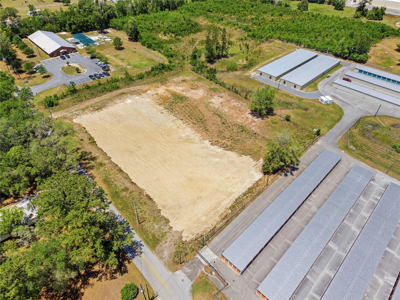 Located in the growing community of Williston, this rare 2.3± acre commercial opportunity is positioned within city limits and zoned C-2, offering outstanding potential for a wide range of commercial and investment possibilities. The property is cleared and ready for future development with plenty of room to bring your vision to life. Whether you are looking to build now, expand your business, or secure land for future growth, this property offers flexibility, visibility, and a prime location in one of North Central Florida’s growing markets.