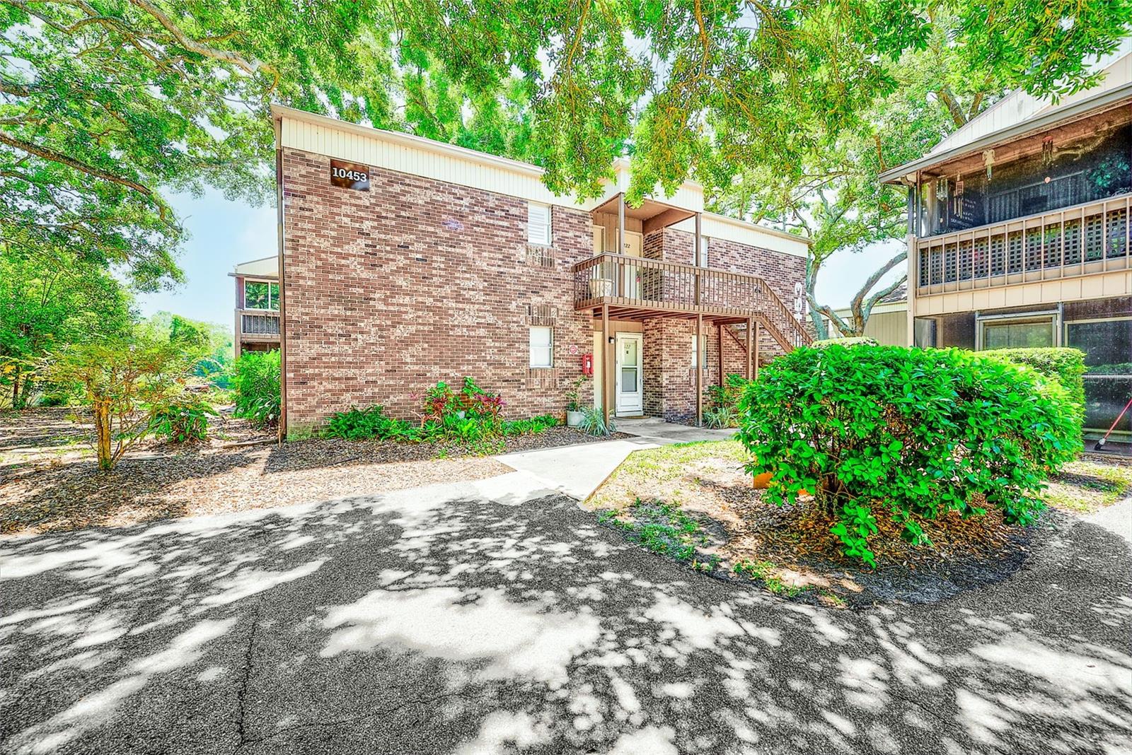 Cute Studio In The Heart Of Tampa! If you're looking for an affordable home located in the heart of Carrollwood this is going to be the place. Lots of improvements in the last couple of years including new engineered wood plank flooring throughout the unit. Newer bathroom with new shower enclosure and fixtures with sink and vanity as well as an interior stackable washer and dryer (very rare to have private in house stackable unit). Home has huge walk-in closet. HVAC system with UV set-up. Private covered balcony with extra storage. Water, garbage, swimming pool and all exterior maintenance and lawn care. Community swimming pool and exterior laundry facility on premises. Convenient location close to eateries, Veterans Expressway and shopping.