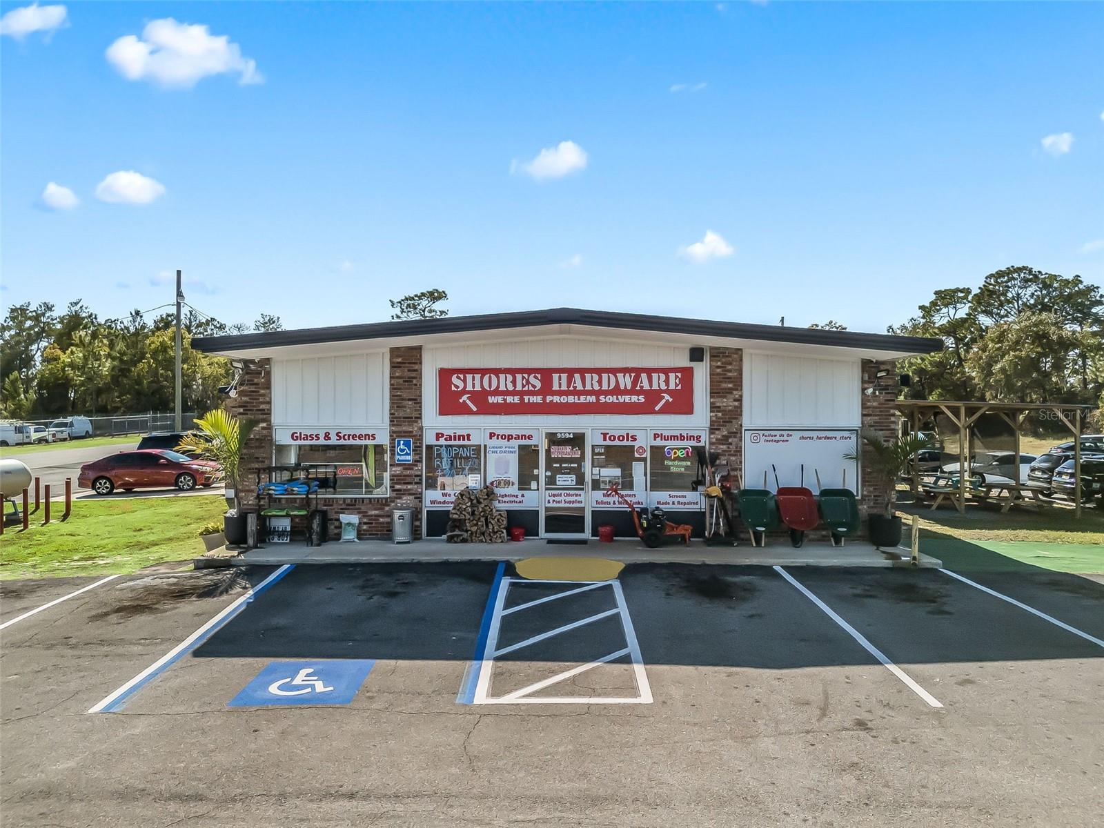 Shores Hardware, located at 9594 SE Maricamp Rd in Ocala, is an established business and long-standing community staple with 51 years of continuous operation, offering a rare chance to acquire a proven, turn-key operation along with its real estate. Founded in 1973, this trusted hardware store generates approximately $250,000 in annual net revenue and offers possible additional income of up to $5,000 a month from on-site rentals, including a food-truck pad, two work bays, and truck parking/storage. Ideal for both owner-operators and investors, this property combines the strength of a respected local brand with multiple income opportunities, making it a stable and strategically smart acquisition. Possible Owner Financing.