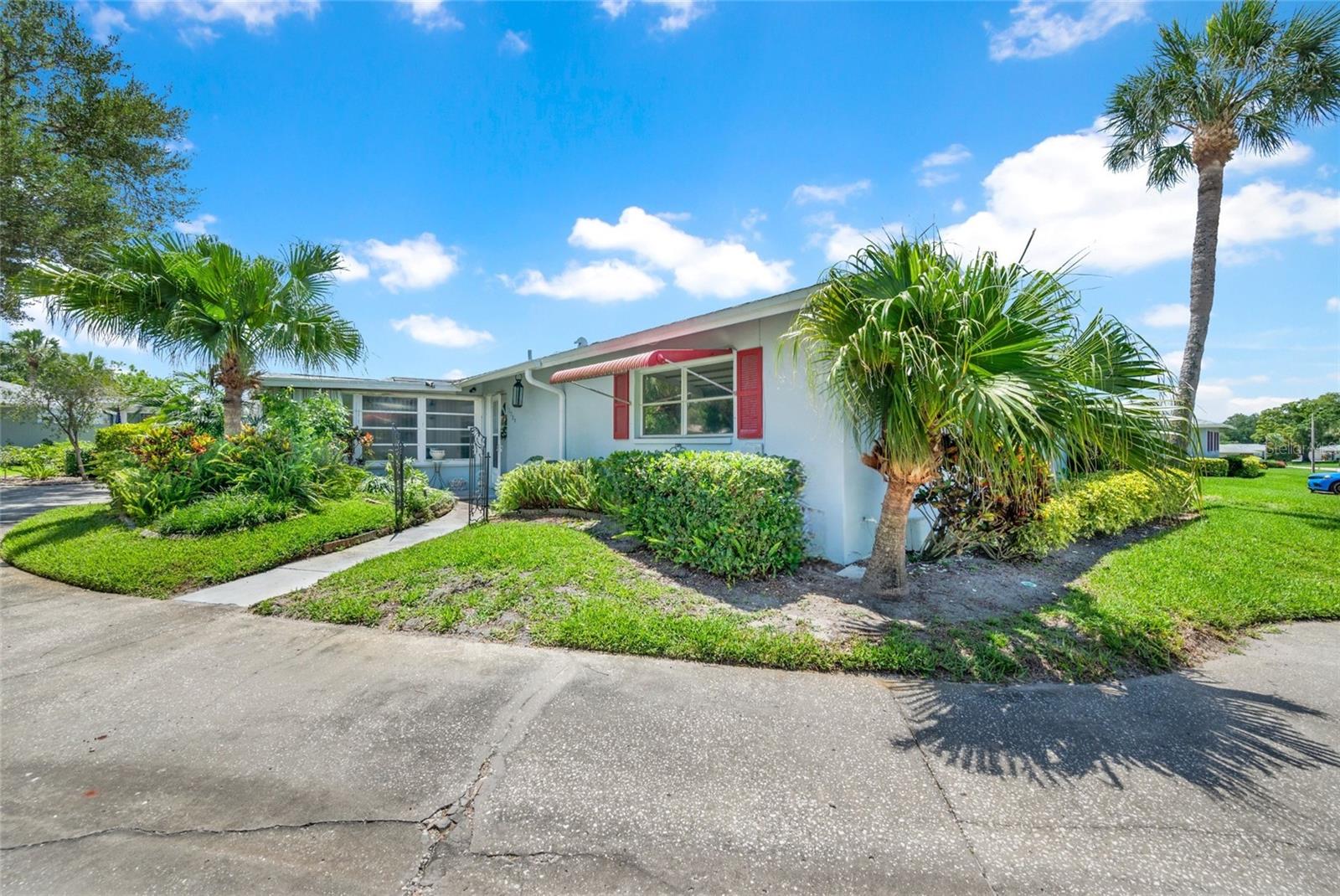 THIS TOTALLY  "STAGED CONDO" and ALMOST UPDATED to the max..is a  must to see.....Located in a "SWEET SPOT" with SHADY TREES & GREEN SPACE ON A QUIET cul de sac of Whitebridge Drive. lOCATED IN THE MOST SOUGHT OUT 55+ COMMUNITY WITH 3 EXECUTIVE -FREE GOLF COMMUNITY ON LAKE TARPON.  Upon entering you will notice the "OPEN CONCEPT" of this adorable condo.  The pride of ownership and well maintained condo you will feel when you enters into this light and bright Lovely Home... All dated Popcorn ceilings removed, newer neutral color Engineering Flooring throughout except for Bedrooms have neutral carpeting.  A wall removed in kitchen for an Open Concept with newer white GE Profile Stove, newer 30' Cubic LG Refrigerator, Large Gorgeous Chandelier for extreme bright lighting in OPEN kitchen area. All popcorn ceililngs removed with new paint. Open concept also to Florida Room, doors/walls removed for making condo one basic room.  The cheerful bathrooms have been updated with newer showers, and also with shower heads. Enjoy the Olympic heated pool and jacuzzi at main clubhouse at 3300 MacGregor Drive, and watch the water aerobics..Mon. Wed. Fri with Yoga too. Walk to the Andover pool and Clubhouse from this Condo. Also Visit 127 Lake Point Drive our other Clubhouse on Lake Tarpon and sign up for Pontoon boat ride on lake with lunch at Tarpon Turtle.  This community has so many classes and events for Men and Women....You can stay as busy as you want or not! Enjoy Woodworking, ceramics, photography, pickelball clinic, tennis, bocce, bowling leagues, bingo, shuffleboard.  Free boat storage for RV & Boats for residents too....  Come visit this WONDERFUL COMMUNITY TODAY you will amazed at all activities for all....
