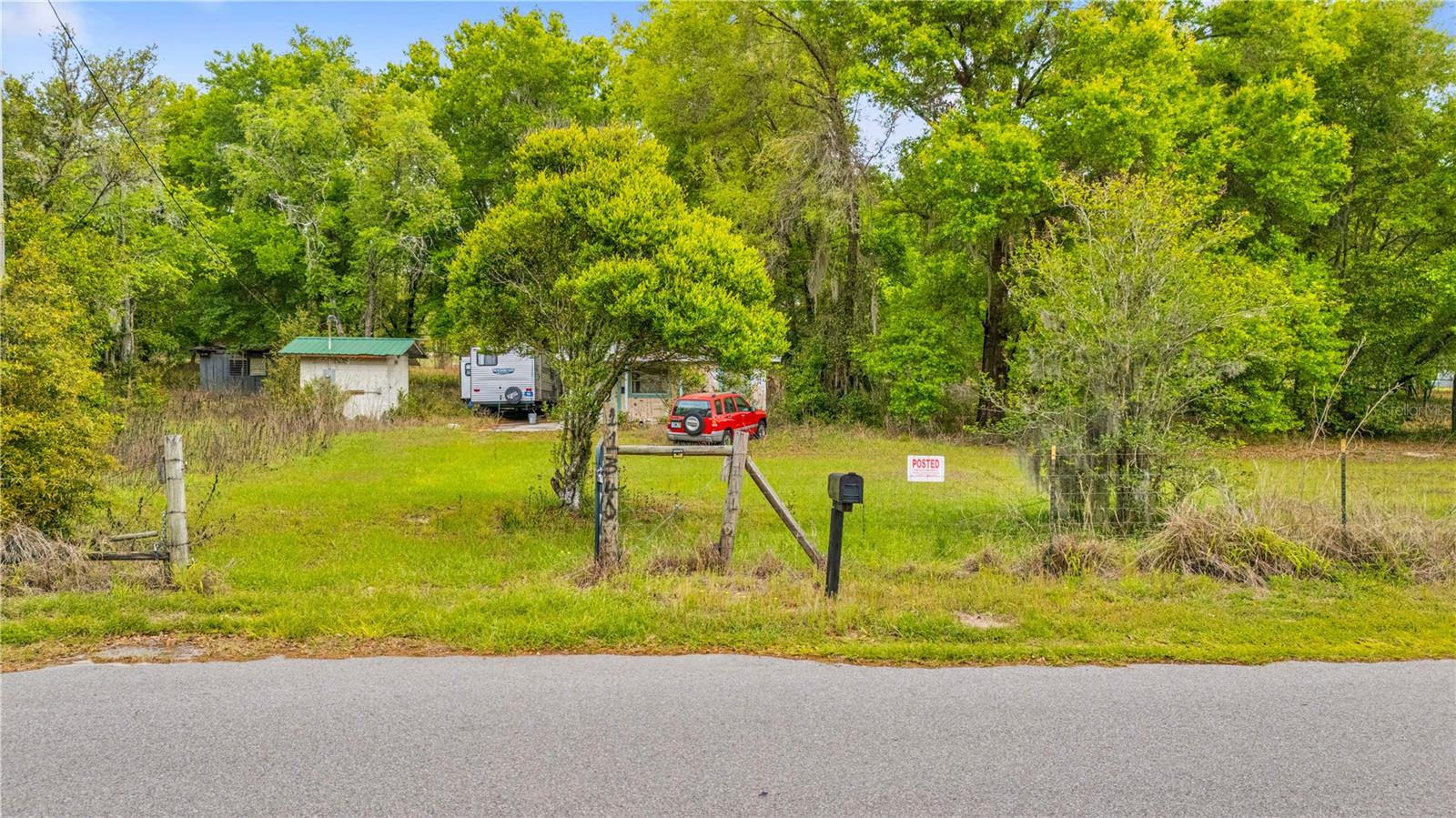 Rare Development Opportunity on 3.86 Acres in Seffner!

Exceptional opportunity to own a 3.86-acre parcel in the growing Seffner area, located near Mango Road with convenient access to Tampa and major commuter routes including Interstate 4.

This property offers ASC-1 zoning with future land use R-1, allowing approximately one home per acre, making it an attractive opportunity for custom builders, developers, or buyers seeking a private estate property with room to grow. With approximately 506 feet of road frontage and a desirable rectangular shape, the parcel offers strong potential for subdivision into multiple homesites (subject to county approval).

The property is partially cleared, providing a balance of open space and natural surroundings while allowing flexibility for future site planning. Well and septic are already in place, and public water and sewer are available nearby, offering additional development possibilities. The property is also not located in a flood zone, adding to its appeal for residential development. A permit to install a meter panel is currently in process, adding additional value and convenience for future use or development.

Currently situated on the property is a 396 sq ft home featuring 1 bedroom and 1 bathroom, which could serve as a temporary residence, rental opportunity, or be removed to make way for future construction. The existing structure allows the property to be enjoyed immediately while long-term plans are explored.

Large acreage parcels with this amount of road frontage and development potential are increasingly rare in the Seffner area, especially with close proximity to Tampa, Brandon, and surrounding growth corridors. Whether you’re a custom home builder looking for your next project, an investor exploring development potential, or a buyer seeking space to build a private estate, this property offers incredible flexibility and opportunity.

Don’t miss your chance to secure nearly 4 acres in a rapidly developing area of Hillsborough County.

NOT INCLUDED IN SALE OF PROPERTY: RV and construction materials inside home