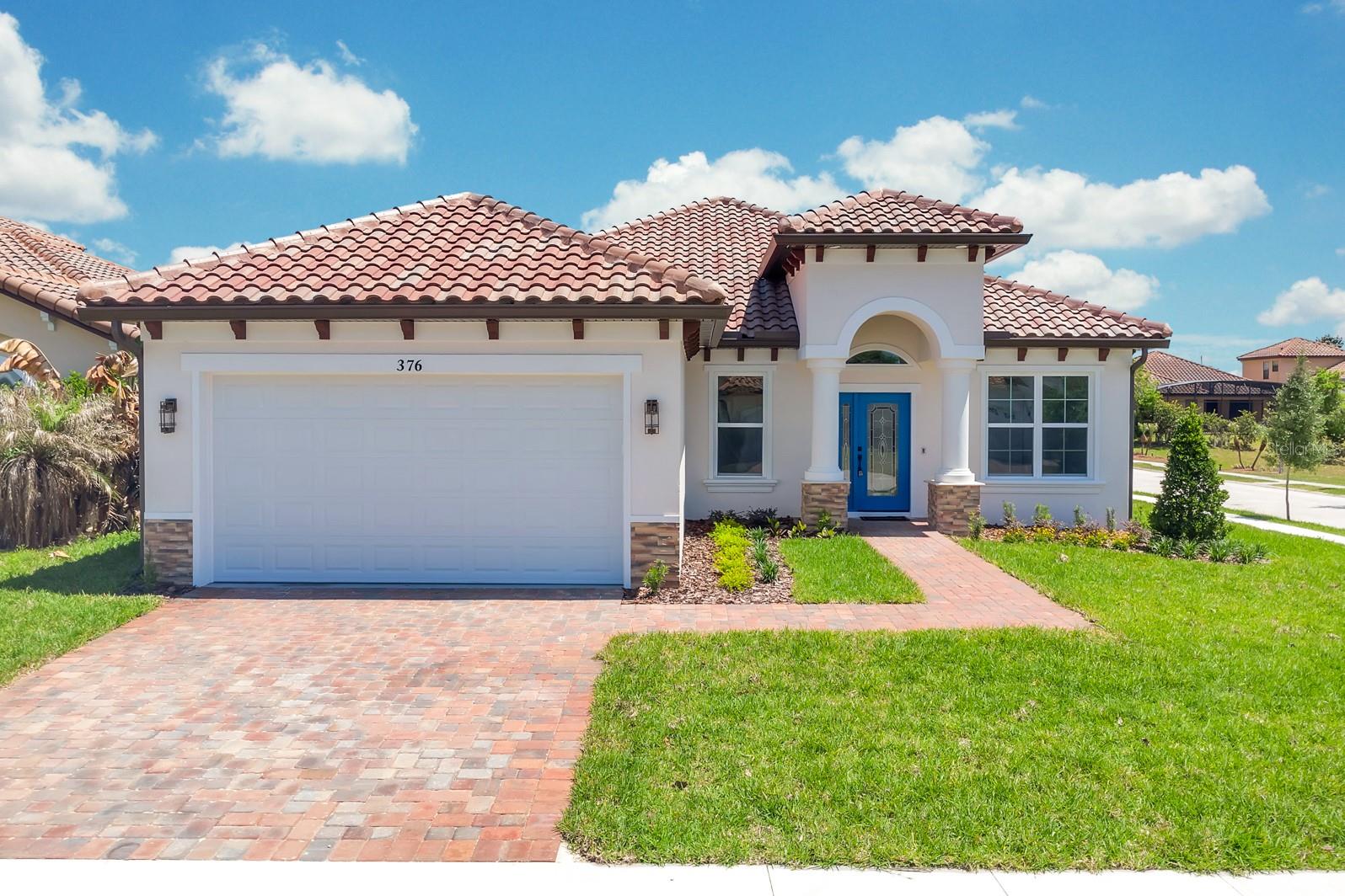 Stunning New Custom Built Home! This 4-bedroom, 3.5-bathroom pool home is located on a corner lot in the beautiful community of Villa Sorrento. Designed with modern luxury and energy efficiency in mind, this home boasts 5” spray foam insulation on the attic ceiling of the entire house and garage, an energy-efficient Carrier HVAC system, digital hot water heater with WiFi and double-pane windows and sliding glass doors. This builder has spared no expense when it comes to the custom details in this home. Inside, you will find upgraded 22 millimeter wear layer, waterproof luxury vinyl plank flooring, complemented by 5 1/4" baseboards. Calacatta two tone granite countertops and full backsplash along with custom cabinets and gold handles were used in the kitchen and bathrooms. The walls and ceilings feature a level 5 smooth finish with upgraded paint package throughout, adding to the home’s sleek, high-end aesthetic. The open floorplan this home offers make it perfect for entertaining. This home features high ceilings and a spacious indoor laundry room.  All bathroom feature backlit mirrors.  The en suite master bathroom boasts a freestanding soaking tub, walk-in shower and dual vanities. The sliding glass doors in the living room lead to the covered porch and screened pool area. The 33'x12' SALT WATER pool features travertine coping, a Caribbean Blue finish and LED lights with a designer brown 3 paver decorative patio. There is a private half bath with access from the pool area for added convenience. The insulated and drywalled garage includes a Rust-Oleum Epoxy Shield-coated floor and a LiftMaster garage door opener with MyQ technology and built-in camera. Outside, a six-station irrigation system ensures effortless lawn maintenance, while the Mediterranean tile roof enhances the home’s curb appeal. Close to schools, shopping, restaurants and major highways. Experience the perfect blend of elegance, comfort, and energy efficiency in this brand-new custom home. Schedule your private showing today!