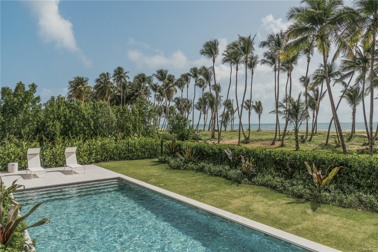 This spectacular Four Seasons Private Residence showcases an innovative and exquisite modern design with direct access to a two-mile stretch of pristine beach and private pool with patio. Featuring 3BR/3.5B expansive beachfront terrace with outdoor kitchen and bar with northeastern exposure fully furnished and equipped. Move-In-Ready.