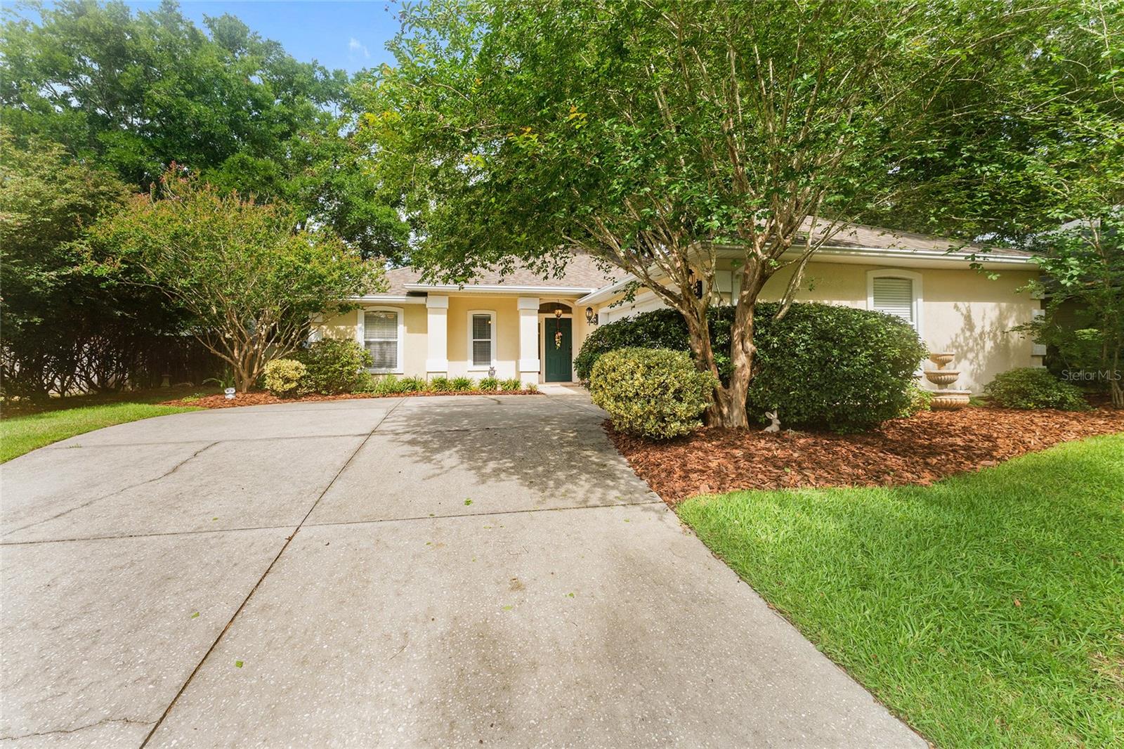 Pride of ownership shines in this well-maintained 3-bedroom, 2-bath home. Located just minutes from the University of Florida, UF Health/Shands, and Santa Fe College, this home offers quick access to everything Gainesville has to offer. Inside, you’ll find a spacious, inviting feel with vaulted ceilings, abundant natural light, and an open-concept floor plan. The great room flows seamlessly into the dining area and kitchen, creating a natural connection that’s ideal for both everyday living and easy entertaining. The home features engineered wood flooring throughout the main living areas and bedrooms, complemented by tile in the kitchen and baths (no carpeting in home). A desirable split-bedroom layout provides privacy, with the primary suite on one side of the home and two guest bedrooms with an additional bath on the other. Notable improvements include a new energy-efficient HVAC system (2025), a new gas water heater (2025), and a full roof replacement (2017), offering added peace of mind for future owners. The dedicated laundry room includes additional cabinetry for extra storage and provides direct access to the attached two-car garage. Step outside to a spacious backyard with an open patio, mature landscaping, and fencing that offers privacy along with potential for gardening, outdoor entertaining, or future customization. Enjoy Capri’s wonderful community amenities just one block away, including a pool, fitness center, clubhouse, tennis courts, and basketball courts. This home offers exceptional value and easy living in one of NW Gainesville’s most convenient locations.