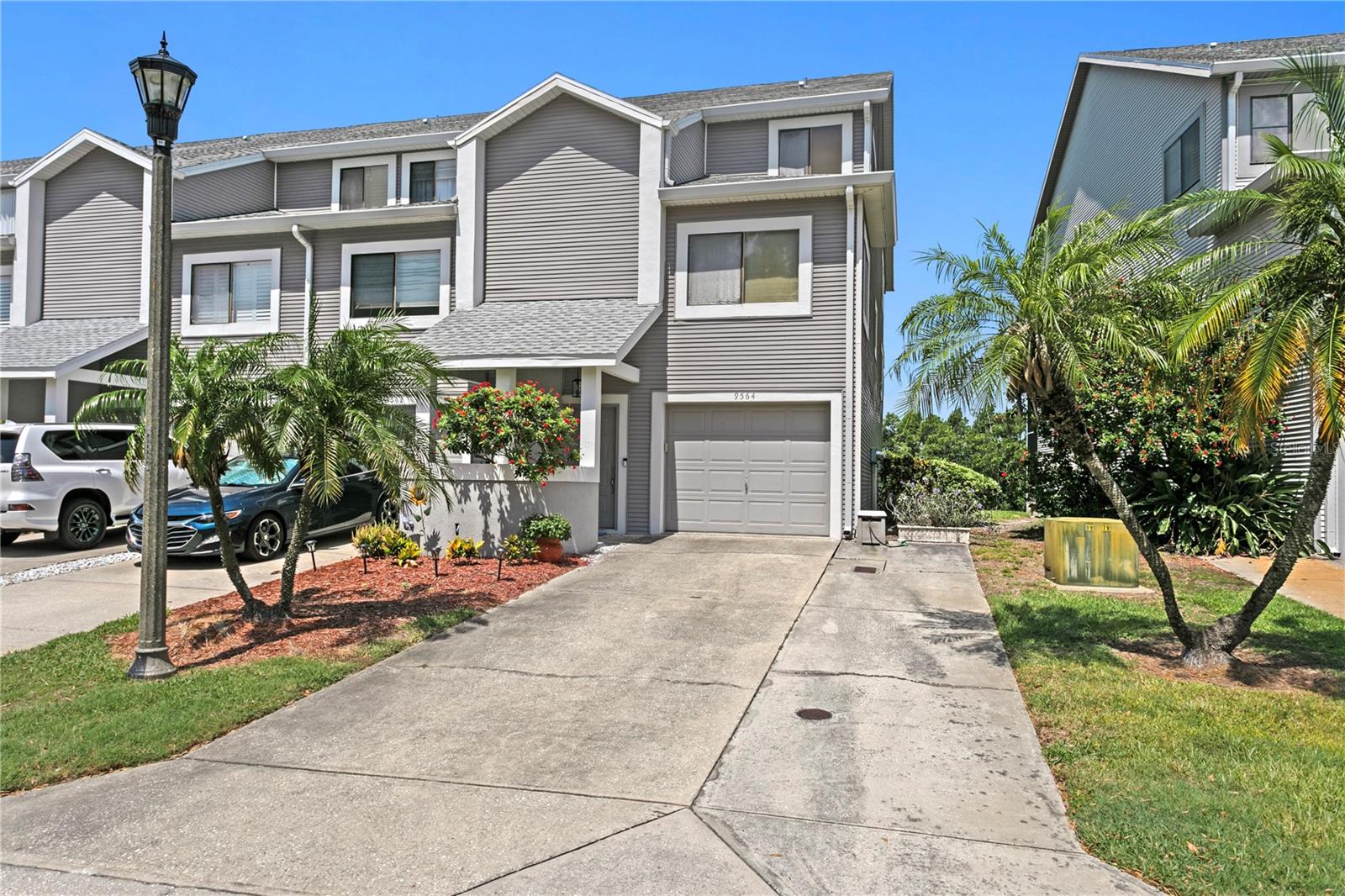 Experience waterfront living in the highly sought-after Tara Cay community, where scenic views, exceptional amenities, and maintenance-free living create the perfect Florida lifestyle. This beautifully updated end-unit townhome offers 3 bedrooms, 4 full bathrooms, and a versatile floor plan designed to accommodate family, guests, or multigenerational living.
Inside, an open-concept layout is enhanced by rich bamboo flooring, custom blinds, and abundant natural light. The showstopping kitchen features rare pearl green marble countertops, stainless steel appliances, and ample space for cooking, entertaining, and gathering. Thoughtfully designed for comfort and privacy, the home includes two spacious primary suites, each with its own updated en suite bathroom. A private ground-floor suite with a full bath and sink area provides an ideal space for guests, a home office, or extended family.
The true highlight of this home is its connection to the outdoors. Multiple screened porches and balconies overlook a tranquil pond and the Intracoastal Waterway, creating a picturesque backdrop filled with native wildlife and stunning western sunset views. Whether enjoying your morning coffee or unwinding in the evening, these outdoor living spaces offer a front-row seat to some of the area's most beautiful scenery. The third-floor balcony was recently rescreened in June 2026, while the primary bathroom shower was tastefully renovated in 2021. A newer hot water heater adds additional peace of mind.
As an end unit, the property enjoys added privacy along with an oversized parking pad. Residents of Tara Cay enjoy access to a community pool and an impressive HOA package that includes water, sewer, trash, basic cable, internet, grounds maintenance, annual dryer vent cleaning, exterior pressure washing, and exterior trim and door painting.
Located just minutes from the Gulf beaches, waterfront parks, shopping, dining, and entertainment, this move-in-ready home offers the rare combination of water views, generous living space, low-maintenance ownership, and an unbeatable coastal lifestyle.