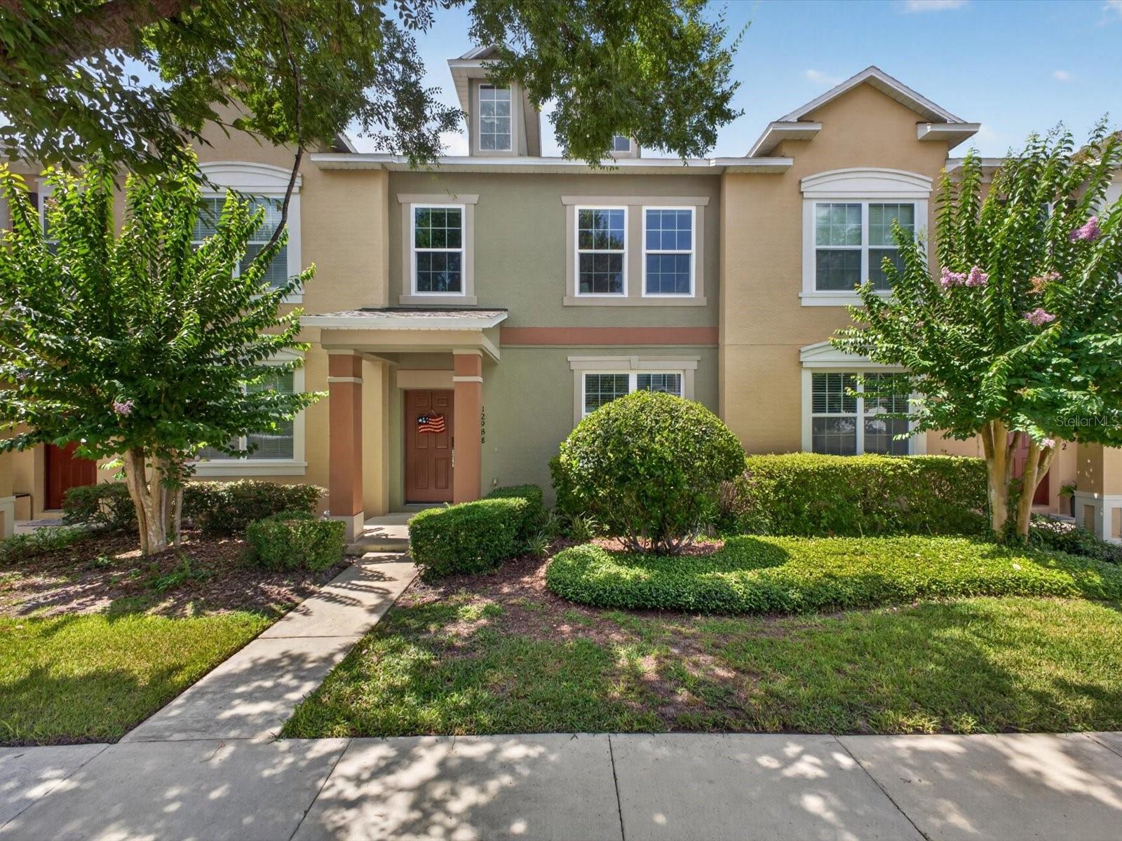 Welcome to 12988 Borland Street in sought-after Wickham Park, where comfort, convenience, and low-maintenance living come together in the heart of Windermere.
This beautifully maintained 3-bedroom, 2.5-bath townhome offers a bright, open floor plan designed for modern living. Natural light fills the spacious living and dining areas, highlighting the ceramic tile flooring throughout the main level. The well-appointed kitchen features stainless steel appliances, a center island, abundant counter space, a large pantry, and a casual dining area perfect for everyday meals and entertaining.
A versatile flex space tucked behind privacy doors on the first floor provides endless possibilities as a home office, playroom, guest retreat, or hobby room.
Upstairs, the spacious primary suite offers a peaceful retreat with a walk-in closet, double vanity, and private ensuite bath. Two additional generously sized bedrooms, an additional upstairs full bathroom, and ceiling fans throughout, provide comfort and flexibility for family and guests. New waterfall faucets have been installed in all bathrooms for a modern touch.
Significant recent updates include a new roof (2024) and impact-resistant windows installed in April 2026, complete with a transferable lifetime warranty.
Step outside to your private, low-maintenance backyard oasis featuring lush artificial turf, decorative stone accents, and vinyl privacy fencing—perfect for relaxing, entertaining, or letting pets play without the hassle of yard work.
The HOA takes care of exterior maintenance, allowing you to enjoy a truly lock-and-leave lifestyle.
Residents of Wickham Park enjoy exceptional community amenities including walking trails, ponds, parks, playgrounds, green spaces, a dog park, and a resort-style community pool. Located within a highly rated school district and just minutes from Publix, restaurants, fitness centers, world-class golf courses, Tibet-Butler Preserve, the Butler Chain of Lakes, Walt Disney World, and major highways including SR 429, SR 408, I-4, and the Florida Turnpike, this home offers unmatched access to everything Central Florida.
Move-in ready and ideally located, this is Windermere living at its finest. Schedule your private showing today.