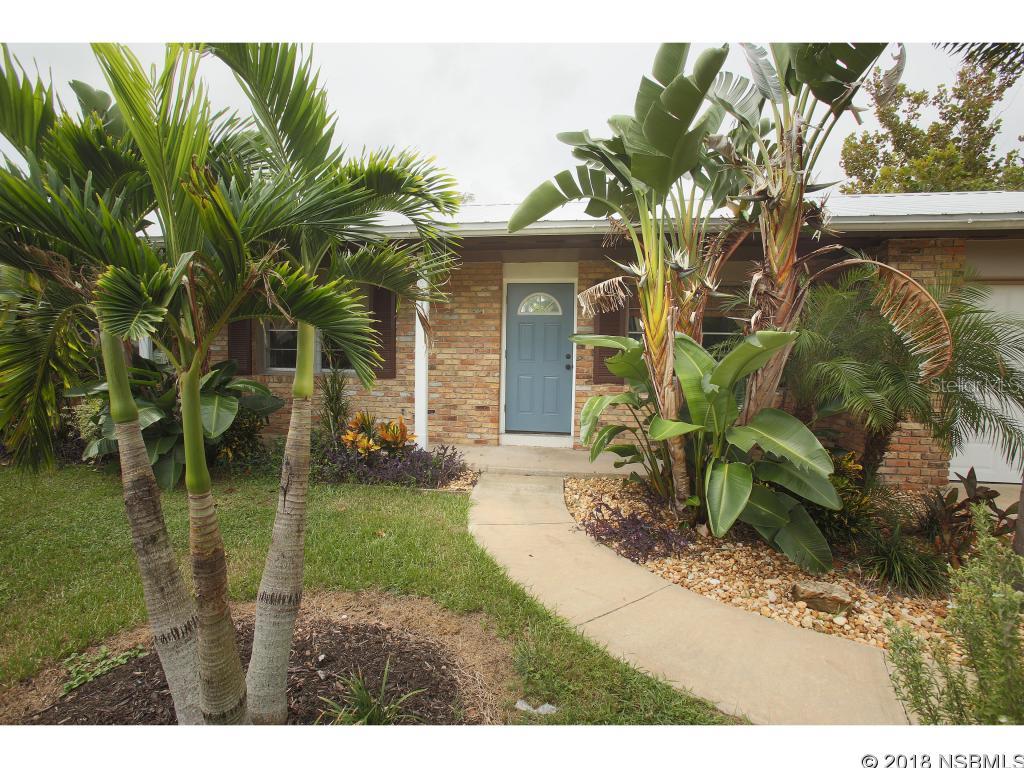MOVE IN READY. BEAUTIFUL 3 BEDROOM 2 BATH HOME WITH UPDATED KITCHEN AND BATHS, JACUZZI TUB, SKYLIGHT IN BATHROOM.  NEW METAL ROOF, NEW A/C AND UPDATED ELECTRICS IN 2015.  TERRAZZO FLOORS UNDER THE CARPETED AREA, LAUNDRY ROOM AND CLOSETS.  THIS HOME WOULD CERTAINLY DELIGHT ANY FAMILY.  OPEN FLOOR PLAN WITH A SPACIOUS EAT IN KITCHEN, LARGE LAUNDRY ROOM WITH PLENTY OF STORAGE, SCREENED IN PORCH, PATIO TERRACE, OUTSIDE SHOWER AND KITCHEN. 1 CAR GARAGE WITH WORKBENCH AREA. BEAUTIFUL MATURE LANDSCAPING, LARGE FENCED IN BACK YARD AND OUTSIDE SHED. ;Water: City