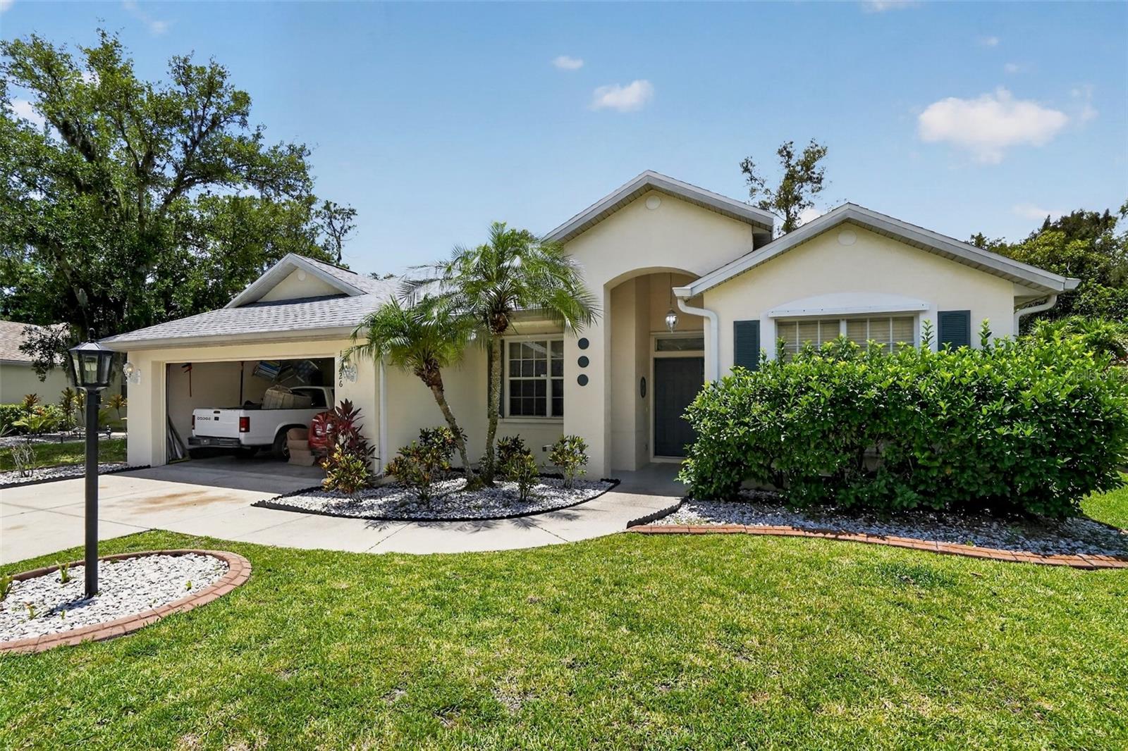 Welcome to this well-maintained and inviting 3-bedroom, 2-bath home located in a quiet, established neighborhood in Lakewood Ranch. Featuring excellent curb appeal, a spacious driveway, and mature landscaping, this property offers the perfect blend of comfort, functionality, and Florida living.
Step inside to discover a bright open-concept floor plan with soaring ceilings, abundant natural light, and generous living spaces perfect for both everyday living and entertaining. The spacious kitchen offers ample cabinetry, plenty of counter space, and flows seamlessly into the dining and living areas.
The primary suite provides a private retreat with a well-appointed ensuite bath, while the additional bedrooms offer flexibility for family, guests, or a home office.
Enjoy Florida living at its best in the screened lanai, ideal for morning coffee, outdoor dining, or relaxing year-round while overlooking the private backyard.