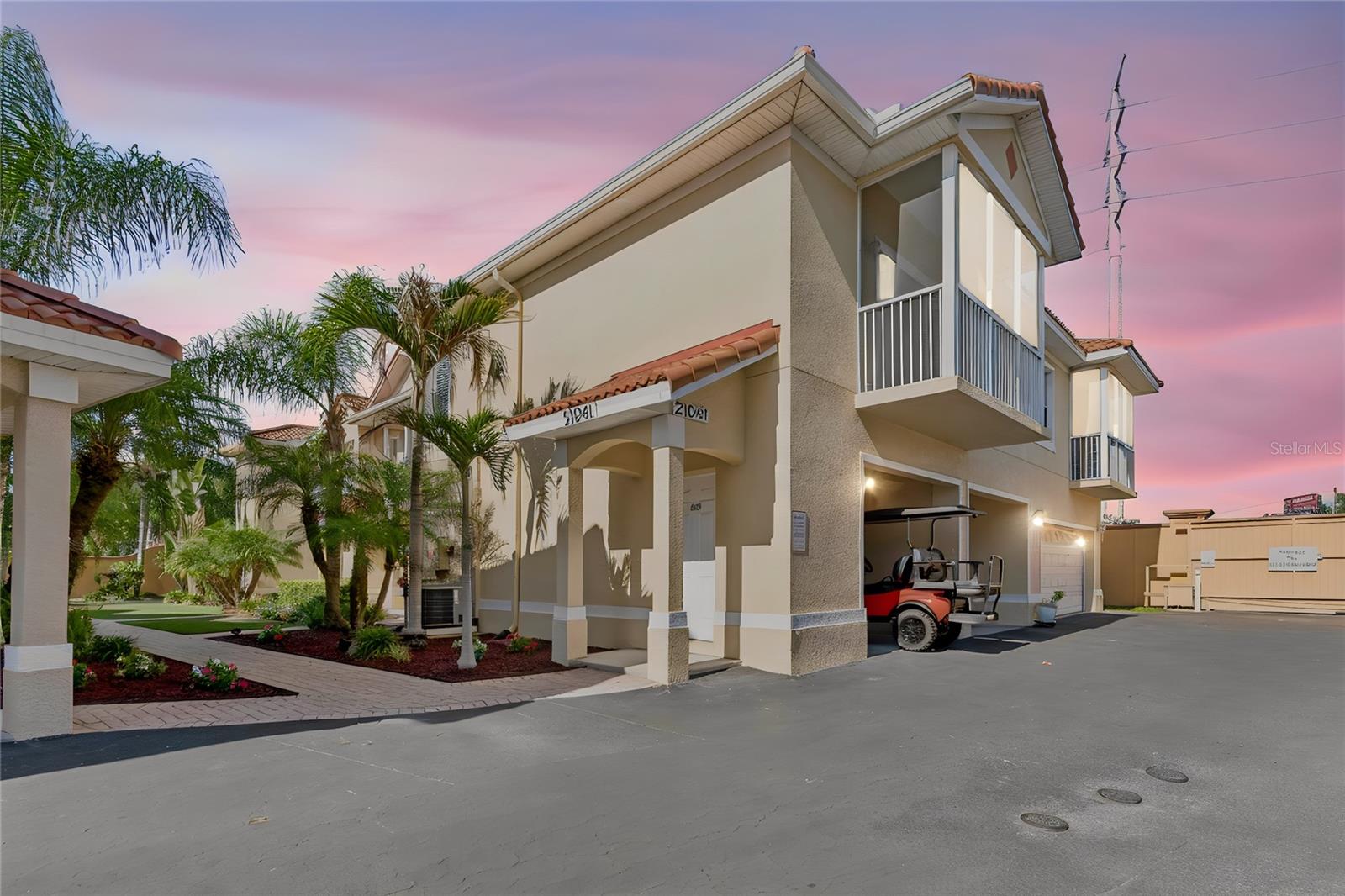 Live the Florida lifestyle in this spacious, open 3-bedroom, 2-bath condo located in the world-famous Paradise Lakes nudist/clothing-optional community. This rare and highly sought-after unit offers exceptional living space,  natural light, and two covered outdoor patios perfect for relaxing or entertaining.

The open-concept floor plan is designed for entertaining, featuring a spacious living room, dining area, and an impressive kitchen with 44-inch cabinetry, granite countertops, a center prep island, and an oversized breakfast bar with seating for six or more. Large sliding glass doors from the living room, primary suite, and third bedroom provide seamless access to the covered patios, creating an inviting indoor-outdoor living experience.

The expansive primary suite features a walk-in closet and a luxurious en-suite bath complete with dual vanities, a bidet, a linen closet, a water closet, and an oversized walk-in shower with dual shower heads. The second bedroom also offers a walk-in closet, while all bedrooms include ceiling fans and lighting. Ceramic tile flooring is featured throughout the bathrooms, kitchen, foyer, and indoor laundry area.

Additional highlights include an oversized garage with a separate storage room and plenty of additional storage space.

Residents have the option to join Paradise Lakes Resort, an adult clothing-optional resort offering four heated pools, a hot tub, indoor and outdoor bars, two restaurants, an expansive sun deck, pickleball, water volleyball, and the popular Club Reveal nightclub. Daily and annual memberships are available, allowing residents to enjoy the extensive amenities and vibrant social atmosphere of this unique resort community. Resort membership is optional and required to access amenities, including the pools, tennis courts, fitness center, nightclub, and bars.