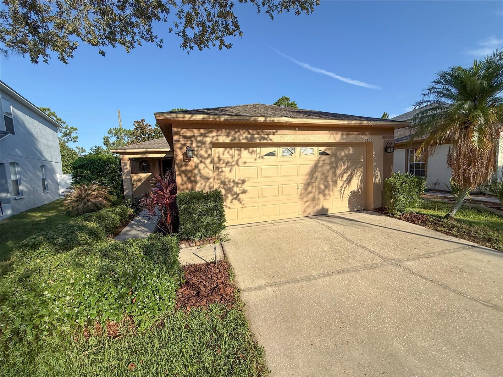 Virtually Staged. Welcome to Riverview's Panther Trace. This 1 story block home offers an open concept floorplan with 1296 square feet, 3 bedrooms, 2 bathrooms and 2 car garage. This split bedroom floor plan greets you at the door with secondary bedrooms immediately to your right along with a full bathroom. Continue into the heart of the home and find a spacious living and dining room area right off the kitchen. The kitchen includes closet pantry, ample cabinet and counter space, pass through to the dining room and area for a table. The sliding glass doors take you out to a nice sized fenced in backyard with patio. The Primary Suite is directly off of the living/dining room, separate from the secondary bedrooms, and includes walk in closet, vanity and step in shower. Easy access to interstate, restaurants and shopping. It's good to be home.