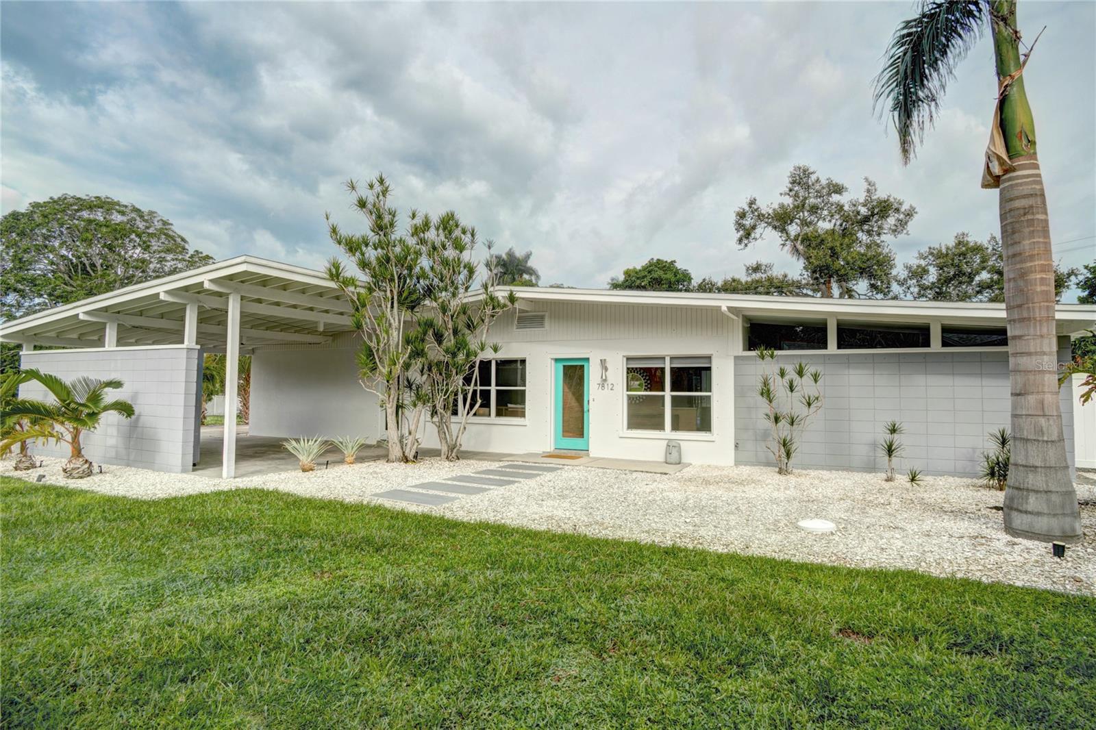 Step into this beautifully renovated, turn-key mid-century modern masterpiece, where classic design meets contemporary luxury. This stunning home has undergone a complete transformation, preserving its iconic architectural integrity while incorporating the finest modern amenities and finishes. No detail has been overlooked; all remodeling is complete, offering a truly move-in-ready experience.
The open concept living area, with its dramatic vaulted ceilings, is bathed in natural light front and back, showcasing the clean lines and spaciousness that define mid-century modern style. A chef-inspired kitchen features top-of-the-line stainless steel appliances, custom cabinetry, and a large center island perfect for entertaining. 
Enjoy a private retreat in the serene primary bedroom suite, complete with a spa-like ensuite bathroom featuring a walk-in shower and elegant double vanity. Two additional bedrooms provide ample space for family or guests; each thoughtfully designed with comfort and style in mind.
The true highlight of this property is the incredible indoor-outdoor connection to the private backyard sanctuary. The primary bedroom, back guest bedroom, kitchen, and living area all transition seamlessly to the outdoor oasis. A sparkling, newly resurfaced swimming pool and spa are the centerpiece, surrounded by a spacious, modern patio ideal for lounging and al fresco dining. The mature, lush, and low-maintenance landscaping enhances the private, tranquil atmosphere, making it the perfect setting for relaxation and year-round gatherings.
Located in Pamla Sola Park a desirable neighborhood known for its unique architectural homes, this  property offers not just a house, but a lifestyle. Located only a few homes from Palma Sola Bay (Flood Insurance not Required) and you walk to Rose park and enjoy sunsets right on the bay. Join the Palma Sola Yacht Club and get your name on the list for the community boat slips that allow you access boating access to Anna Maria Island, Longboat Key and Gulf of Mexico.  This is a rare opportunity to own a meticulously restored mid-century modern home with a pool, where all the work has been done for you. Available as a fully furnished turn-key rental (minus some personal items) or as a move in ready year-round home. It is just minute to Anna Maria Island and the Gulf Beaches and Robinson Preserve where you can enjoy 700+ acres of biking, jogging, kayaking and paddle boarding.