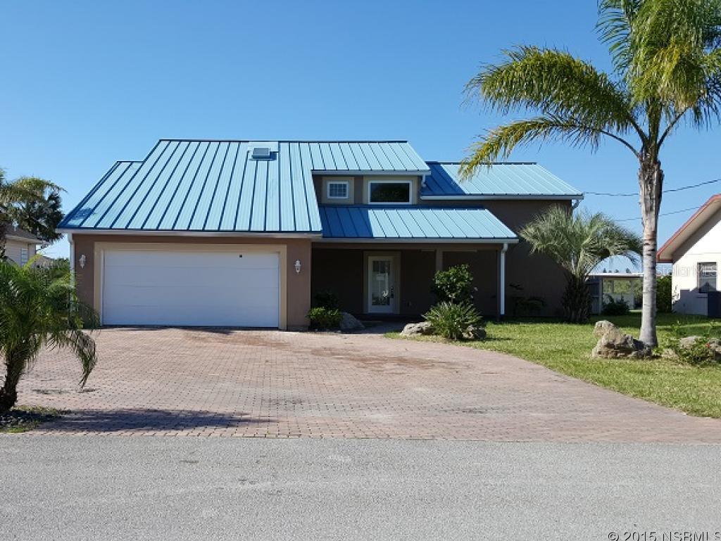 BANK OWNED "Sold As Is"  This home as all the charm for that lifestyle of living on a salt water canal. Plenty of beautiful views from almost every room. The kitchen has loads of space for a gas burner and griddle, double ovens and already equipped with 2 sinks. The wood burning fireplace sets the scenery in this combo Living/Family Room.  Master Bedroom has huge walk in closet and bath.  Upgraded features include Paver Driveway, Marble Tile, Hardwood Floors, Boat House with Jet Ski and Boat Lift.  ALL INFORMATION RECORDED IN THE MLS INTENDED TO BE ACCURATE BUT CANNOT BE GUARANTEED ;Water: City
