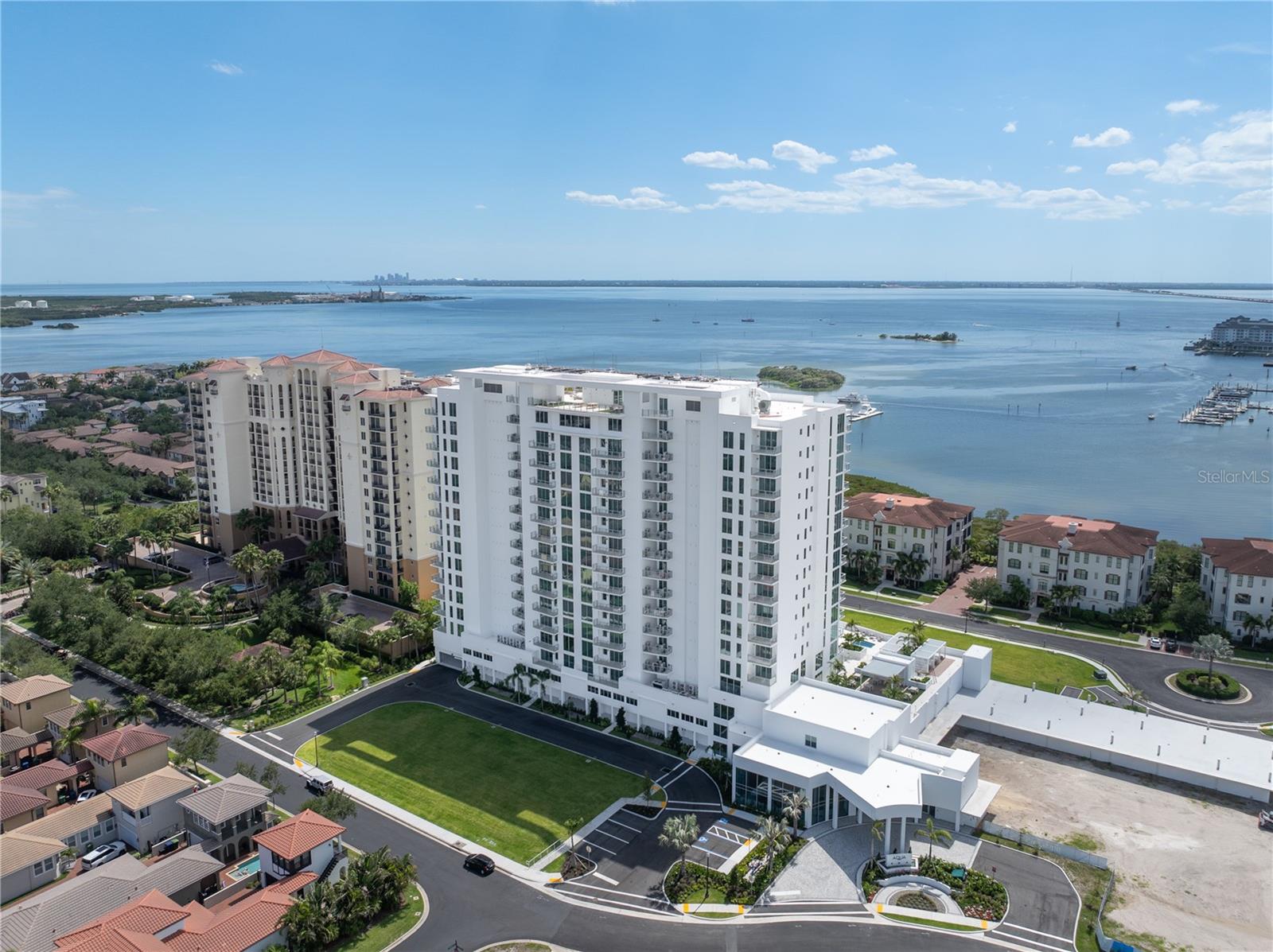 Introducing AQUA at Westshore Yacht Club on the grounds of the exclusive gated waterfront community in South Tampa. Residence #1001 an end unit with 3 bedroom, 3.5 bath plus a den/4th bedroom with 2,691 Sq.Ft  and an additional East facing terrace accessed from the 3rd bedroom. Westshore Yacht Club’s newest residential tower: standing 17 floors, offering 77 luxurious condominium residences with sweeping sunset views and sunrise city views. Secure fob private elevator that opens into your private entry foyer. Interiors boast the finest finishes such as Italkraft premium cabinetry, quartz waterfall countertops, large format porcelain tile, Sub-Zero and Wolf appliances with induction stove top. Wide-open sun filled living and dining rooms with floor to ceiling windows and sliders accessing the West facing terrace, offering amazing sunset and Bay views.  Generously sized Owner’s Suite enjoys 2 walk-in closets, spa-inspired Owner’s bath with large walk-in-shower and freestanding soaking tub, private lavatory enclosure, 2 separate vanity locations with premium fixtures. Amenity rich, the building features a rooftop sky pool with bay views and private cabanas, with breathtaking views of Old Tampa Bay, plus a 3rd floor pool with spa, outdoor grilling station and lounge area.  Spacious and elegantly appointed club room with conversational seating areas, sports lounge and billiard area and private dining room. State of the art golf simulator, theater with plush seating, private offices, children’s playroom and 2 fully furnished guest suites. Bay Front fitness center on the 17th floor with yoga and spin room. Climate controlled storage for each residence on the same level. Residents and guests will be welcomed by valet attendant under the covered porte-cochere entrance leading to the residential lobby, with a signature ceremonial staircase that leads to the second floor lounge library. 24/7 staffed lobby, on site property manager and service personnel ensure an effortless lifestyle. Westshore Yacht Club is South Tampa’s premier unique Gated waterfront community, boasting the exclusive members-only Bay Club and Marina, 175 boat slips, two resort style swimming pools, outside Tiki Bar, and indoor fine dining, 806 Sunset bar, Day Spa, fitness center, community, and dog parks. All this and only 30 minutes to the beaches, 15 minutes to downtown Tampa and St. Petersburg, as well as Tampa and St. Pete Airports, and all the restaurants & shopping Tampa Bay has to offer.
AQUA offers a stunning amenity package… Including free-flowing pools, private resident’s lounge, 3 rooftop sky pools, state of the art fitness, private screening room, pickleball in future phases and so much more! This indulgent lifestyle is all included at AQUA. Combining this with an optional membership to the Bay Club,  AQUA stands out as  one of the most enviable lifestyles in all of Tampa at a price point that can’t be matched by any other development in the Tampa area! For a limited time, Westshore Group is offering a 1 year membership to the Bay Club included in the price, as well as other incentives. Come and explore our sales gallery and take a tour of the last available site at Westshore Yacht Club… Discover the AQUA difference!