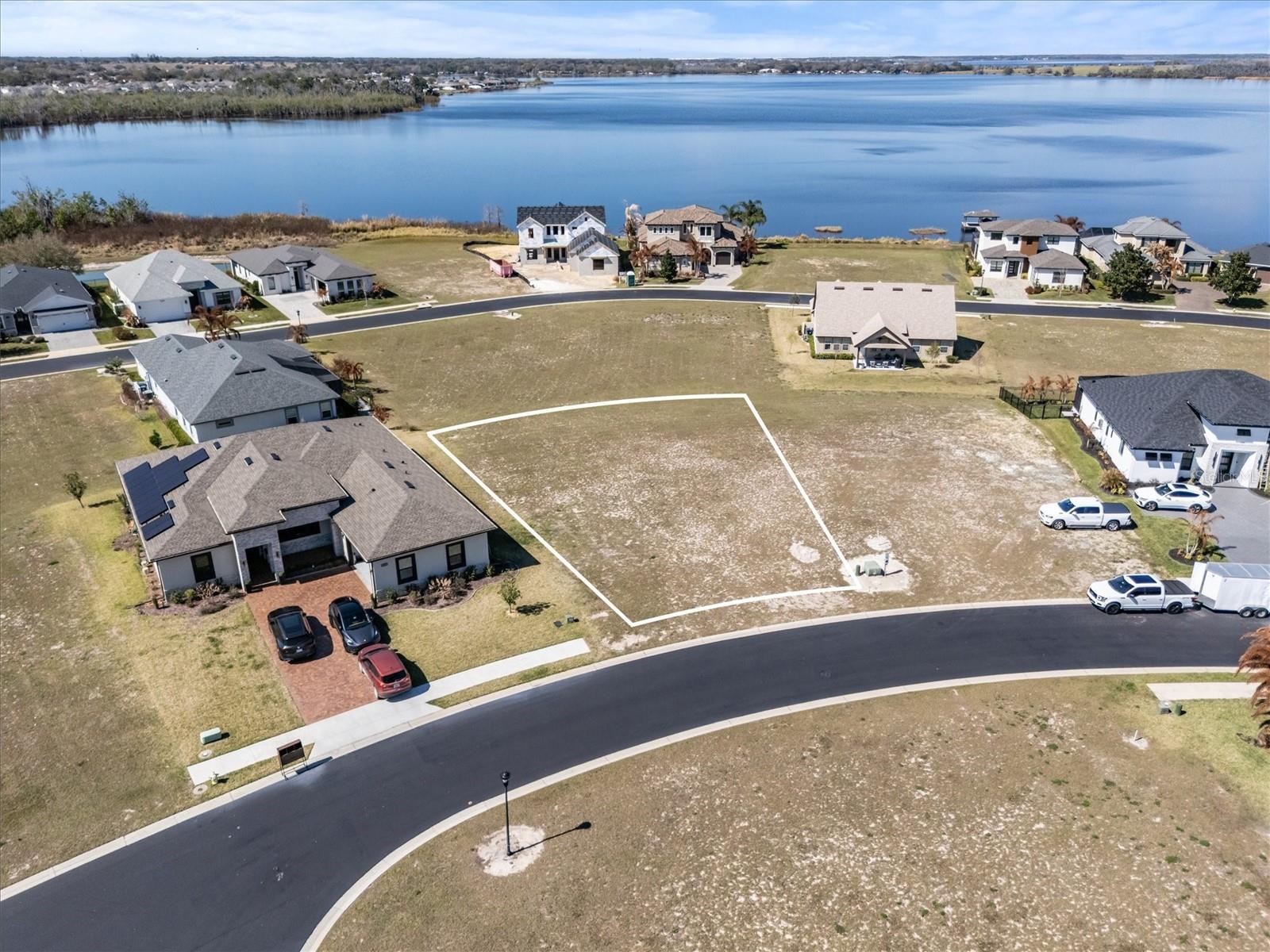 Build your custom home in the gated, lakefront community of Water Ridge in Auburndale. Situated on elevated terrain with gently varying topography, this  private, gated community is surrounded by Lake Van, Lake Medora, and Lake Alfred. Amenities include multiple pools, clubhouse, fitness center, sauna, tennis and pickleball courts, and walking trails. This homesite features rear-facing views of Lake Van.

Residents enjoy private access to Lake Van, Lake Alfred, and Lake Medora — ideal for boating, fishing, water skiing and simply enjoying Florida’s outdoor lifestyle. Conveniently located between Orlando and Tampa, you’ll have quick access to major highways, shopping, and dining while enjoying the tranquility of a tucked-away private lakefront community.

Don’t miss your chance to own in one of Central Florida’s most desirable communities! Schedule a tour today!
