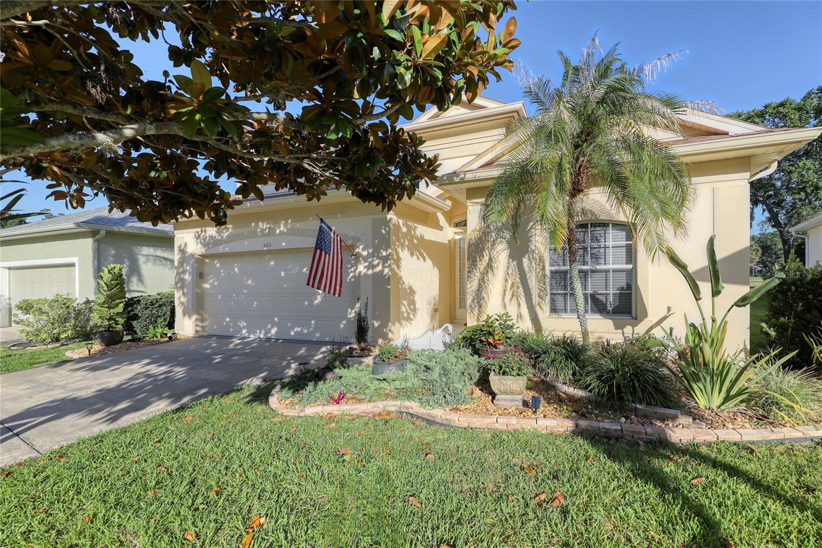 Beautifully Updated and Decorated 3-bed, 2-bath Cul-De-Sac home in the Peaceful Gated, Village Woods at La Cita. Just steps away from the Lee Trevino designed 18-hole Championship Golf Course including Restaurant, Swimming, Golf and Tennis! Enjoy Stunning Water Views and conservation from the recently Enclosed Screened Rear Patio, Lush Landscaping, offering Privacy and Tranquility. Inside features Open and Bright Split floor plan with 10-12 Ft Ceilings throughout, Tile flooring in Main areas, carpeted bedrooms, a Formal Dining room, and a Cozy Eat-In Kitchen Nook. Recent upgrades include a newer Roof installed in 2024, newer AC, newer kitchen appliances, washer/dryer, hot water heater, and fresh interior paint. Just added Customized Maple Wood Panel Accent Wall in the Family room. Equipped with Seamless Front Shutters and storm shutters in the back for added peace of mind. French Doors Divide the Great Room from the Family Room, which would make a Perfect Office or Lounge area