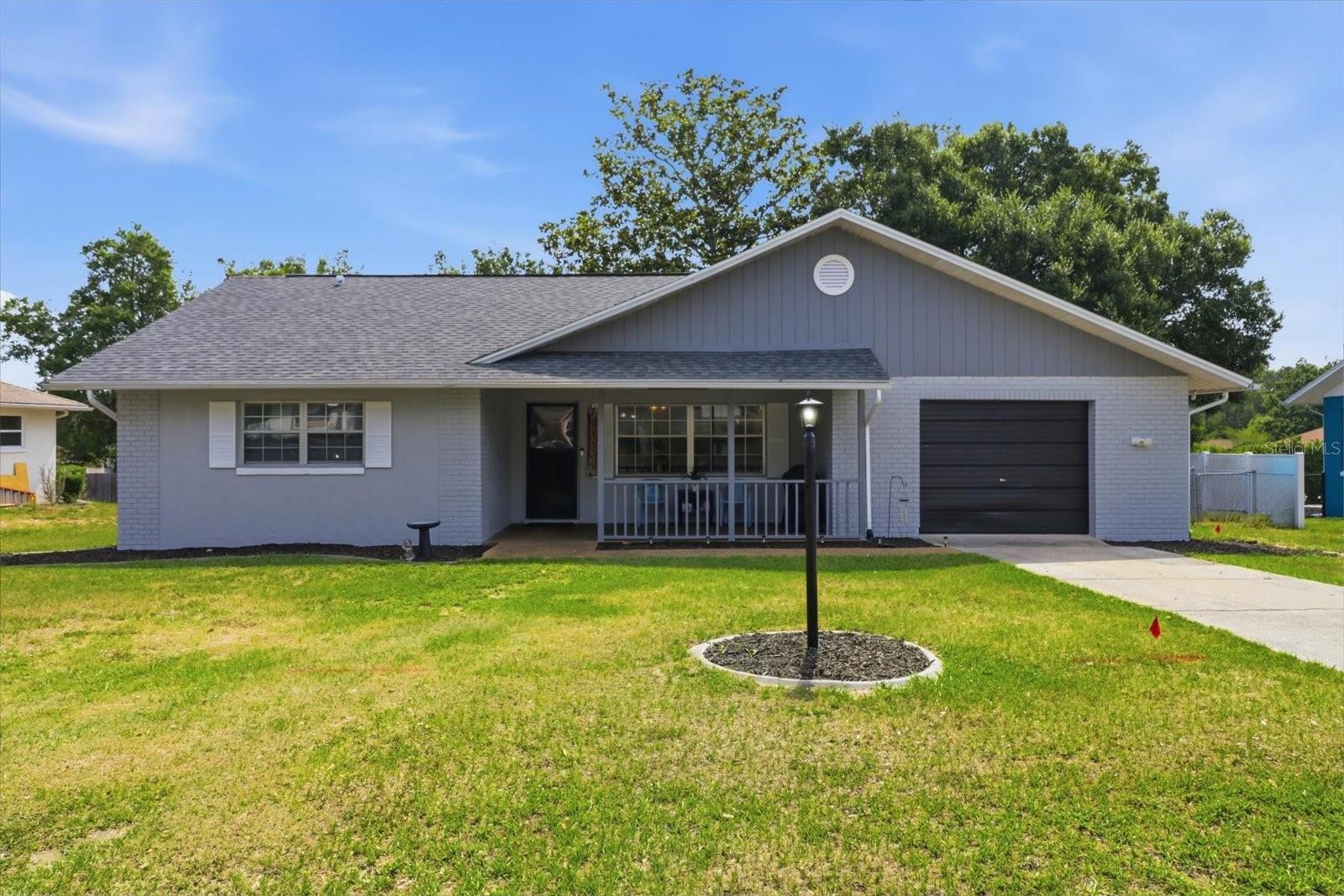 Total peace of mind comes with this beautifully updated 2-bedroom, 2-bath home featuring a versatile bonus room currently used as a 3rd bedroom! Thoughtfully refreshed from top to bottom, this home delivers modern comfort, style, and worry-free living. Major upgrades include a brand-new roof (2025), new AC system (2025), and newer water heater (2024), along with fresh interior and exterior paint (2025) that gives the home a bright, clean, and contemporary feel. Step inside to find all-new flooring throughout—soft carpet in the bedrooms and durable LVP in the main living areas—paired with fully renovated bathrooms showcasing a fresh, modern design. The flexible bonus room/den offers endless possibilities—ideal for a home office, guest space, playroom, or hobby retreat, adapting easily to your lifestyle needs. Perfectly situated in the heart of Beverly Hills, this home offers unbeatable convenience. You’re just minutes from shopping and dining in nearby Lecanto, as well as quick access to regional medical facilities, including a newly opened stand-alone ER and a soon-to-be built hospital. The Suncoast Parkway is also close by, making commuting and travel effortless. With all the major updates already completed, this home is truly move-in ready—perfect for buyers seeking low-maintenance living in a centrally located Citrus County home. Seller is providing a home warranty!