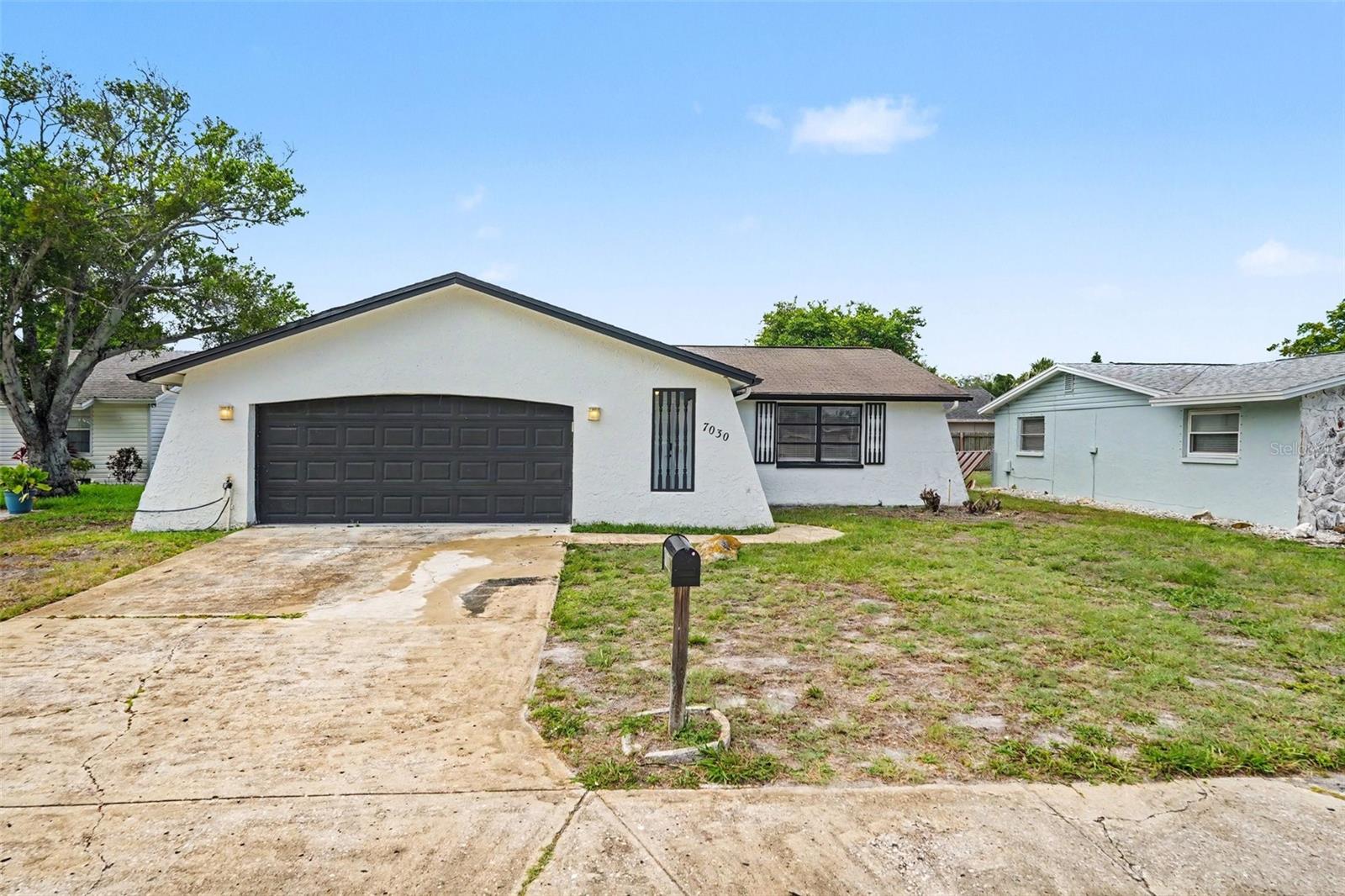 This beautiful 3-bedroom, 2-bathroom home offers the perfect blend of comfort, functionality, and effortless single-level living. The heart of the home showcases a contemporary kitchen fully equipped with a matching suite of modern stainless steel appliances, making it a stylish and highly efficient space for all your meal preparation. Designed to maximize your everyday living and entertaining, the interior transitions seamlessly outdoors to a private backyard, providing a fantastic outdoor canvas that is absolutely perfect for pets, play, gardening, or relaxing weekend barbecues. Complete with an attached 2-car garage providing secure parking and extensive extra utility storage, this turn-key ranch-style residence is thoughtfully optimized for easy, low-maintenance modern living.