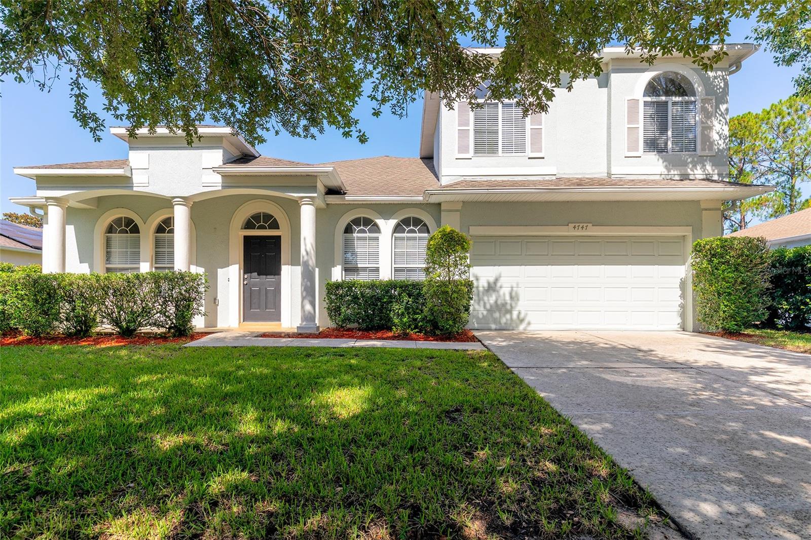 Virtually Staged. Welcome! This four-bedroom, two-bathroom pool home delivers the Florida lifestyle you've been imagining. A covered front entry welcomes you to a residence framed by mature hedge borders, while an in-ground pool and screened lanai transform the backyard into your personal resort. Tile flooring flows throughout the main living spaces, creating a clean, unified foundation across the entry foyer, dining area, living room, family room, kitchen, and guest bedrooms. Luxury vinyl plank surfaces the primary bedroom suite and the spacious upstairs bonus area, which could easily serve as a fifth bedroom. The kitchen anchors the residence with granite countertops, a breakfast bar, and recessed lighting that opens directly to the family room, making it the natural gathering place. Adding to the functionality, a slider offers a lovely view of the glistening pool from the family room and kitchen and expands the living space outside, erasing the boundary between indoors and out. The split-bedroom floor plan maximizes privacy, while the large primary suite is a true escape measuring 15’ by 25’, plus a spacious closet and a private slider to pool area, perfect for daily relaxation. Outside, the screen-enclosed in-ground pool area features a poolside sun deck perfect for relaxation year-round. The greenery bordering the backyard provides natural privacy and established landscaping that frames the property beautifully. This property sits close to University of Central Florida and offers easy access to SR 417 Expressway for commuting convenience. You're minutes from Publix Super Market, near Waterford Lakes Town Center, and close to Blanchard Park, the Little Econ Greenway Trail, Downey Park, and Full Sail University. The location balances suburban tranquility with urban accessibility, positioning you near daily needs, primary services, recreation activities, and educational institutions. Schedule your private showing today and experience the lifestyle this property offers firsthand.