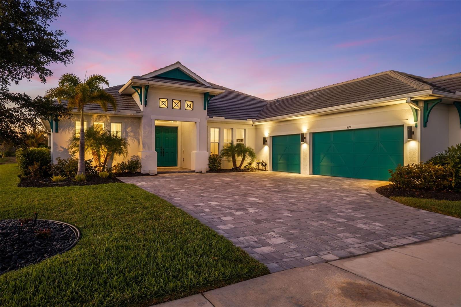 LOW HOA & NO CDD FEES!

This Cardel Homes Martin model offers over 2,800 square feet of thoughtfully designed living space, including 4 bedrooms, a dedicated den, and a separate office, wrapped in 2022 construction quality with no CDD and lower HOA fees than the Waterside communities just minutes away.

The layout works. An open great room connects to the outdoor living space without wasted hallways, while the split bedroom arrangement gives the primary suite genuine privacy. Work-from-home functionality is built in, not retrofitted.
Out back, a heated pool and spa extend the living space year-round. Whether it's a morning swim before a showing or an evening gathering under the Florida sky, this backyard delivers without requiring a second look at the utility bill.

What buyers in this price range often miss: Worthington offers the easy access to Lakewood Ranch and even closer proximity to Waterside (10 minutes to waterfront dining and events) without absorbing the CDD premiums that inflate carrying costs in comparable communities. On a 30-year hold, that gap is material.

3-car garage. Premium finishes. Move-in condition.