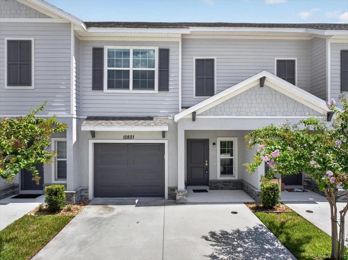 Life at Calusa Creek! 
Welcome home to Calusa Creek, a charming, low-maintenance community built by Sunrise Homes where modern design meets everyday convenience.
Built in 2024, this beautifully upgraded 3-bedroom, 2.5-bathroom townhome offers nearly 1,700 square feet of thoughtfully designed living space with an upstairs loft, screened lanai, attached garage, and NO CDD fees.
The OPEN-CONCEPT FLOOR PLAN showcases LUXURY VINYL FLOORING, HIGH CEILINGS, and a spacious kitchen complete with QUARTZ COUNTERTOPS, 42-INCH CABINETRY, STAINLESS STEEL APPLIANCES, and abundant prep space—perfect for entertaining or everyday living.
Step outside to your extended screened lanai, an ideal place to enjoy your morning coffee or relax after a long day. Upstairs, the versatile loft provides the perfect space for a home office, media room, or play area, while the private owner's suite features a walk-in closet and an en-suite bath with dual granite vanities.
Additional upgrades include decorative landscaping, updated lighting, an extended driveway, energy-efficient Low-E windows, a programmable thermostat, and extra garage storage.
Enjoy community amenities including a pool, dog park, and beautifully maintained grounds, all just minutes from I-75, US-301, AdventHealth Riverview, shopping, dining, Tiki Docks, parks, and top-rated schools.
Whether you're a first-time buyer, healthcare professional, or simply looking for a move-in-ready home with modern finishes and an unbeatable location, 10821 Quickwater Court offers the perfect place to call home.