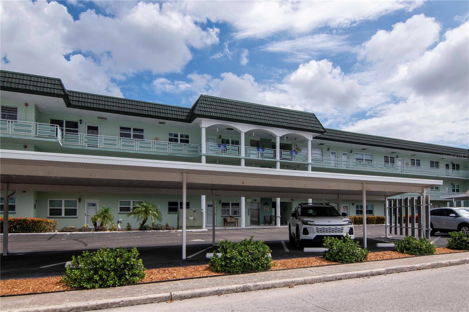 Don’t miss this incredible value in the highly sought-after Town Shores of Gulfport! This beautifully maintained second-floor condo offers the perfect combination of comfort, convenience, and waterfront living. Relax or entertain in the spacious Florida room while taking in breathtaking water views, where you’ll occasionally catch a glimpse of dolphins and manatees. The updated kitchen features real wood cabinetry, high-end stainless steel appliances, including a gas stove, making it a delight for any home chef. The primary bathroom has also been tastefully updated. Additional improvements include double-pane vinyl windows with blinds included and an APCO Fresh-Aire air purification system, providing cleaner, healthier indoor air. Unwind on the front balcony, and enjoy the convenience of the community laundry room located on the same floor. Elevator access is just steps away, offering easy accessibility without the inconvenience of elevator noise. Town Shores is a vibrant 55+ waterfront community offering an exceptional resort-style lifestyle with four community pools, tennis and pickleball courts, and an active clubhouse filled with social events and activities. Ideally located in the heart of Gulfport, you’re just minutes from award-winning Gulf beaches, waterfront restaurants, shopping, and the renowned Fort De Soto Park, where you can enjoy camping, fishing, kayaking, biking, boating, and some of Florida’s most beautiful natural scenery. Schedule your private showing today and discover why Town Shores is one of Gulfport’s most desirable waterfront communities!