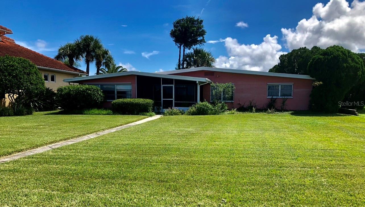 Rare Riverfront Property with over sized lot, located on the famed Richmond Drive! Direct Intracoastal/ DEEP WATER frontage on Bouchelle Island. One of the best waterfront locations in NSB -  Deep water right off the seawall, excellent fishing. Local architectural drawings available for a new home, and boat dock.  Located at the northwest end of Bouchelle Island. Unbelievable views of the River/Intracoastal Waterway and riverfront NSB. A unique little oasis of its own. Close to Flagler Avenue, Canal St. and the Beaches. Imagine a lifestyle with one of the most captivating views New Smyrna Beach has to offer. Watch the fabulous vessels cruise by and see the playful Dolphin swimming. Experience 4th of July fireworks and lighted Holiday boat parades. Spectacular sunsets. Existing single family 1960 home AS IS. 75’+ seawall in place.  Don't just dream it, live it. ;Water: City