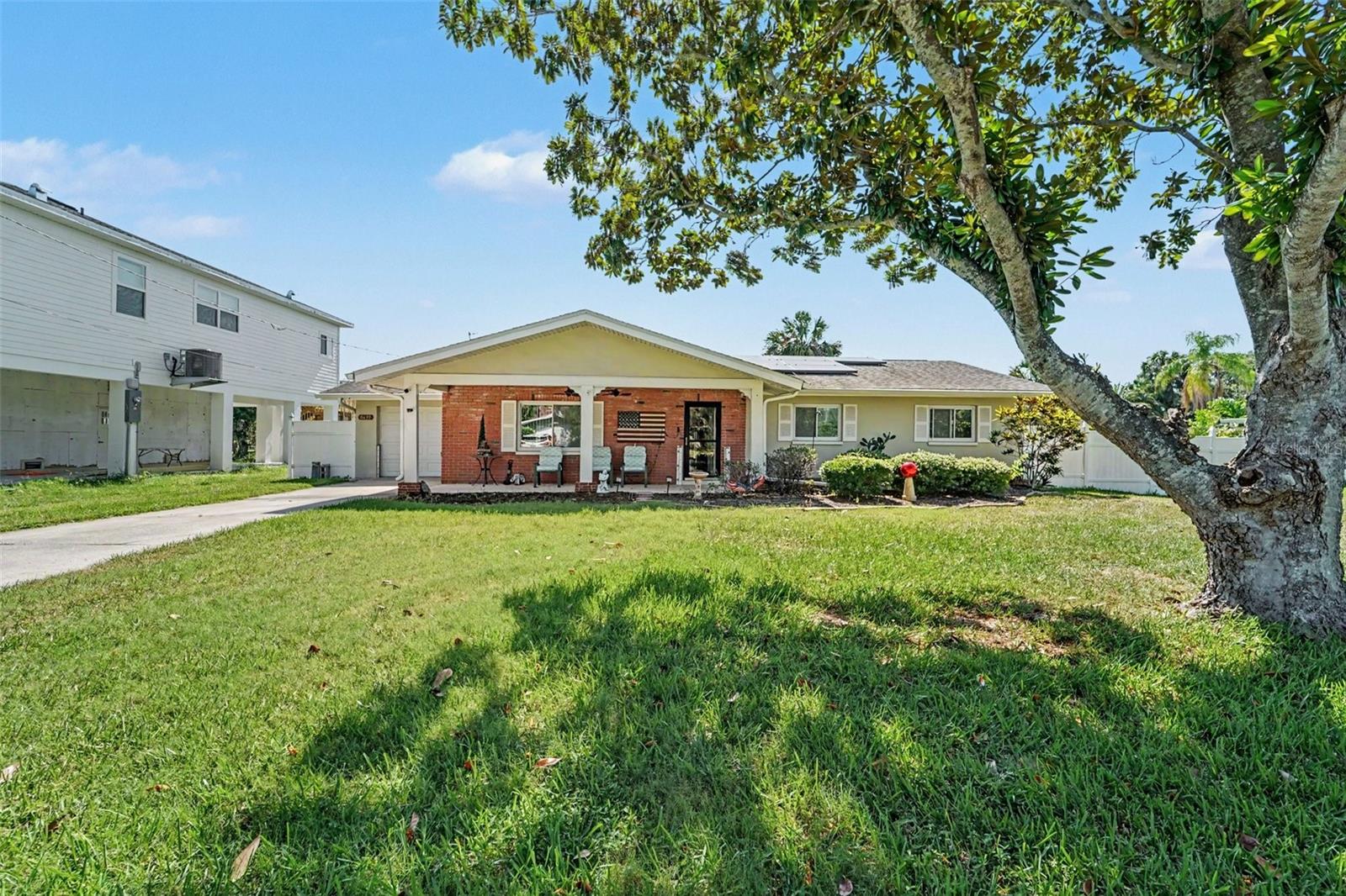 Discover the ultimate Florida waterfront lifestyle at 8639 Green Street in Port Richey! This beautifully updated 3-bedroom, 2-bath home is situated on an oversized lot at the end of a quiet dead-end street in the desirable Martha’s Vineyard community. Enjoy direct saltwater canal access, just minutes to the open Gulf of Mexico.

Inside, you'll find an open and inviting layout featuring a remodeled kitchen with solid wood cabinetry, granite countertops, a large center island, and stainless-steel appliances. Elegant finishes include crown molding, upgraded fixtures, ceramic tile flooring in the main living areas, and spacious bedrooms with generous closet space.

The outdoor living space is truly exceptional, offering a screened-in entertaining area, sparkling pool with spa jets, and beautifully landscaped grounds designed for enjoying Florida’s year-round sunshine. Boaters and anglers will appreciate 80 feet of seawall, dual davits, and a floating dock, providing easy access to fishing, kayaking, and Gulf adventures right from your backyard.

Conveniently located near waterfront parks, dining, and local amenities, this move-in-ready waterfront retreat offers the perfect blend of comfort, style, and coastal living.
