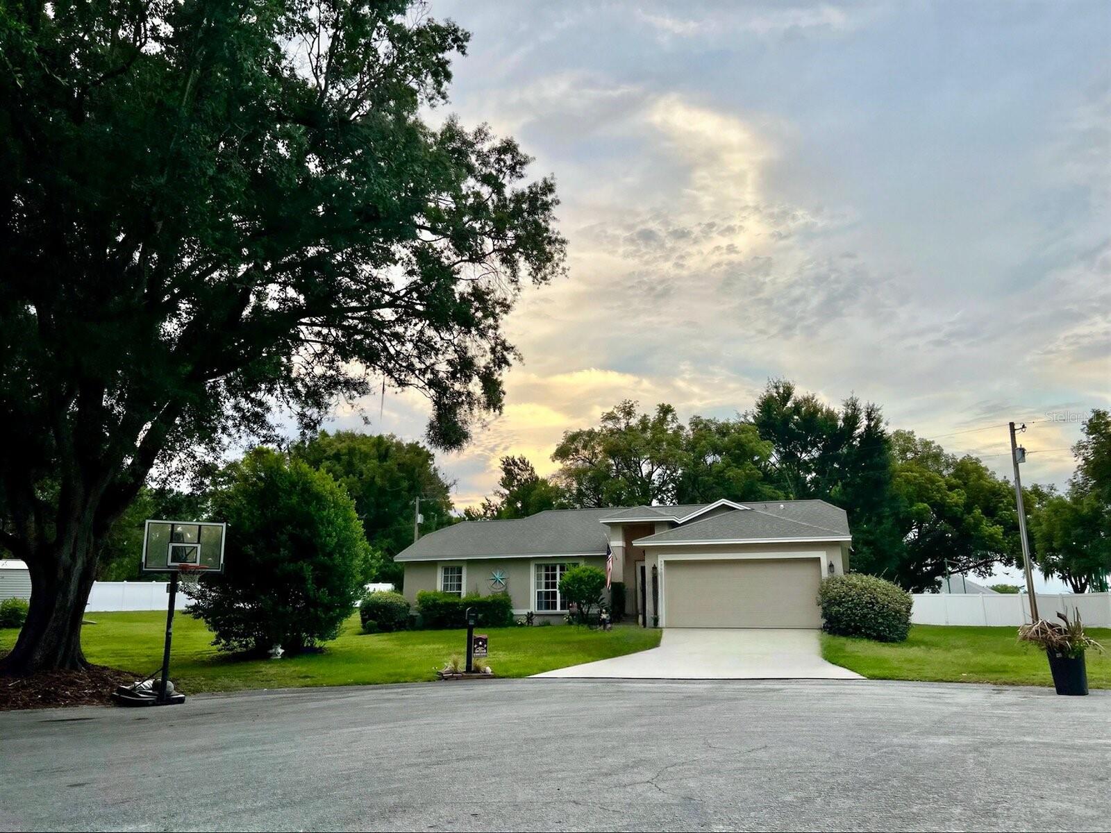 This is a beautiful 3-bedroom, 2-bath home situated on a large lot, on a quiet cul-de-sac street. The home has a divided bedroom plan, an open, airy concept, and a two-car garage.
