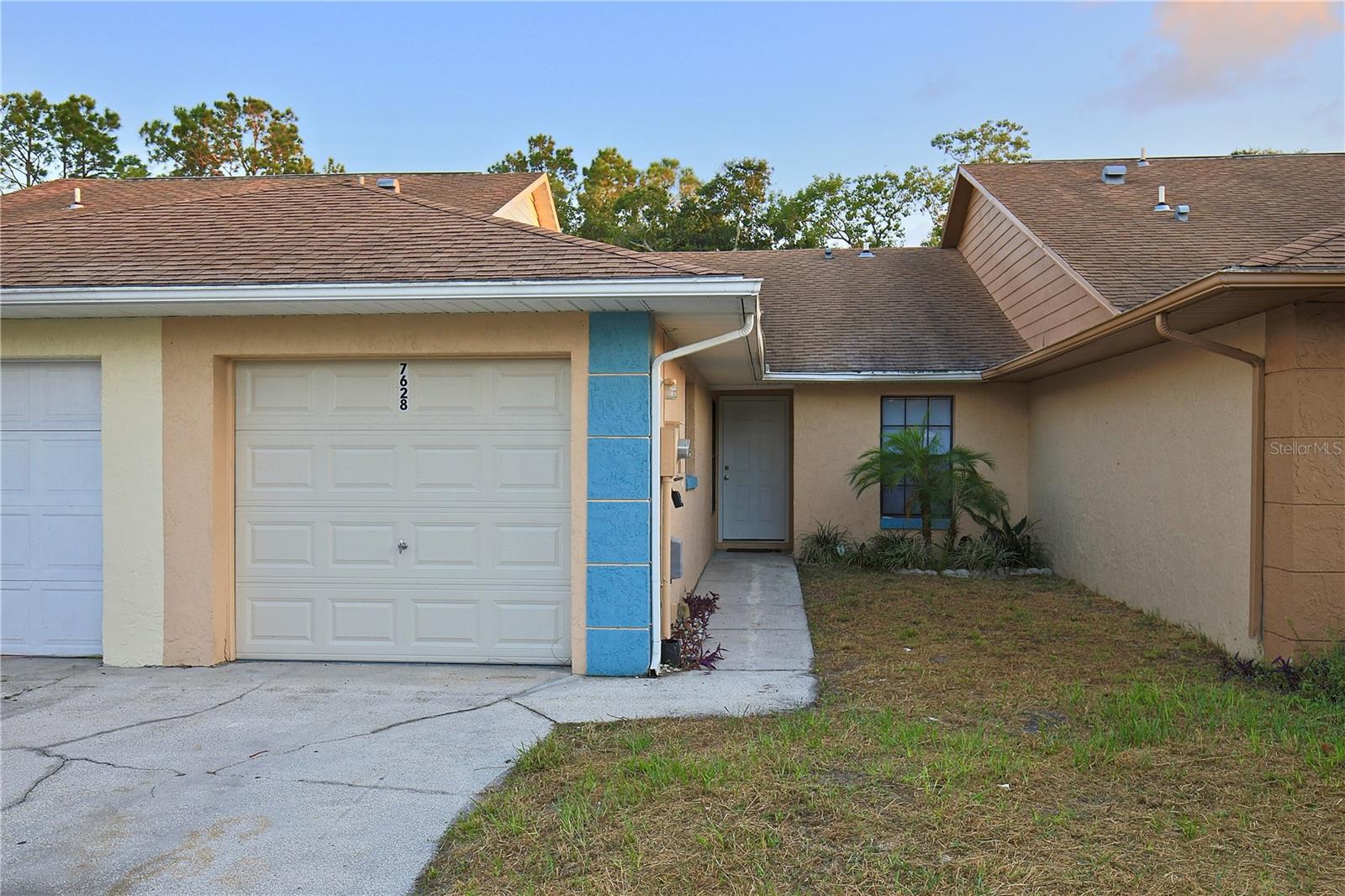 Charming 2/2 Spacious Duplex with a Fenced Backyard and a 1 Car Garage in University Garden - Winter Park! Available Now! Experience the charm and convenience of Winter Park living. This lovely home welcomes you to a spacious living room and dining room combo area, updated with a modern flair and an open floor plan, which is perfect for entertaining guests or enjoying a quiet evening at home. The fully equipped kitchen offers plenty of countertop and cabinet space with a beautiful kitchen backsplash, a small breakfast bar and a closet pantry for additional storage. Tile flooring flows throughout the main living areas and NEW cozy carpet flooring in the master bedroom. Stay cool and comfortable as this home offers ceiling fans in every room. The spacious master bedroom has an ample closet and a full bathroom providing additional privacy. The secondary bedroom offers sufficient closet space and a separate full bathroom for convenience. The sliding doors in the living area lead to the large fenced backyard, beautiful paved patio with a fire-pit, great for a relaxing evening or outdoor activities. Additionally, this home has a spacious 1 car garage with extra space for an inside utility (Washer and Dryer hook-ups only). Don't miss it! Great location in Winter Park, near stores like Target, Costco and Sam's Club are only a few minutes away! You'll have easy access to a variety of shopping, dining, and entertainment options. One small pet will be considered. All residents are enrolled in the Resident Benefits Package which includes AC filter delivery, utility concierge, our best-in-class resident rewards program, and much more! More details in our Rental Selection Criteria or upon application. NO SIGHT UNSEEN APPLICATIONS.