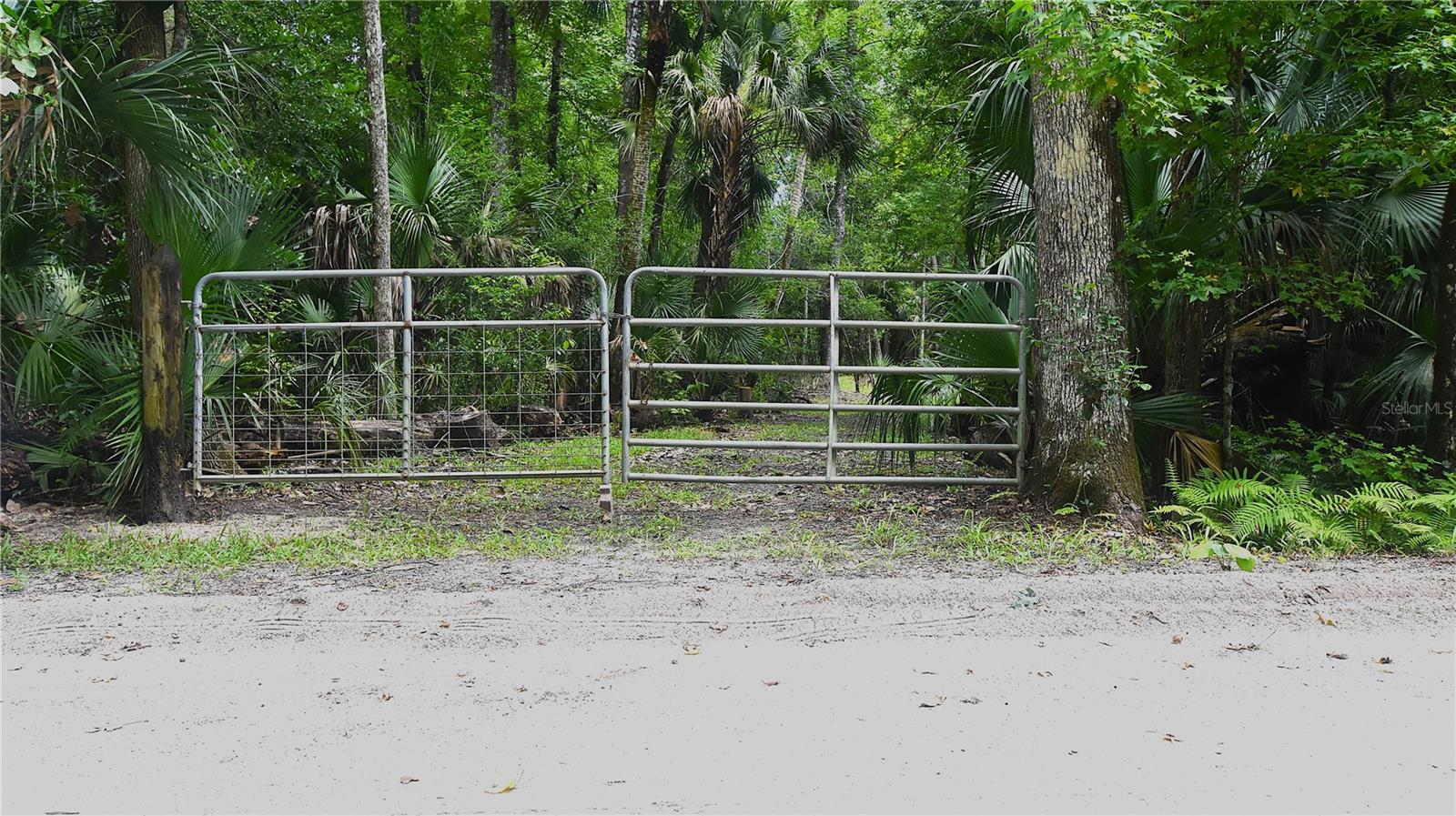 This is a beautiful 5 acre parcel that comes complete with wildlife and privacy, yet is still close enough for convenience to civilization, shopping, entertainment, and the beach. This is the perfect location to unwind, do some plinking, hunting within season, and just enjoying the get away from daily hustle and bustle. Please notice in the photographs there is an incredible platform built by the owner that stands 10 feet tall and provides more than ample room for lounge chairs, cots, even a side table and reading light if thats your thing. Its the perfect place to spend a few nights high and dry and away from the critters. The structure is solid and very well built and will be standing for many years to come. Locations like this are becoming almost impossible to find, especially this close to modern conveniences. Check out the photos and videos, this might be the right place and the right time for some privacy and fun!

This parcel has been inspected by a state certified biologist to determine the wetland/upland distribution within the parcel boundaries.