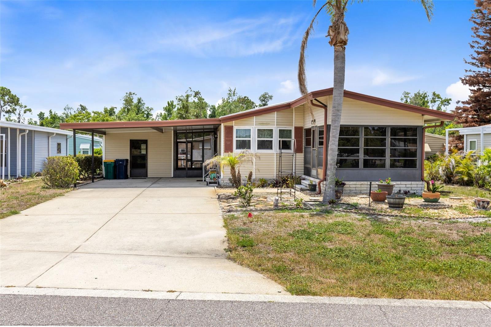 Welcome to the highly sought-after Fox Run 55+ Community, where active adult living meets resort-style amenities! This well-maintained 2-bedroom, 2-bath home offers plenty of space to relax and entertain, featuring a large Florida room and a separate screened porch, perfect for enjoying Florida's beautiful weather year-round. This home has been thoughtfully updated with major improvements already completed, including a new HVAC (July 2025), replumbed in 2023, new water heater (2023), replacement windows (2019), and a new carport (2025). Additional upgrades include a new dishwasher, toilets, and garbage disposal (2022), plus a brand-new stove that has never been used. Beyond the home, you'll love the lifestyle that Fox Run has to offer. Residents enjoy a vibrant clubhouse with regular community events and activities, two swimming pools, shuffleboard courts, golf cart-friendly streets, a marina, and a scenic boardwalk with access to the Harris Chain of Lakes. Whether you're looking to stay active, socialize with neighbors, or spend your days boating and fishing, Fox Run offers something for everyone. Don't miss your chance to own a move-in-ready home in one of Central Florida's most desirable 55+ communities. Come experience the lifestyle you've been looking for!
