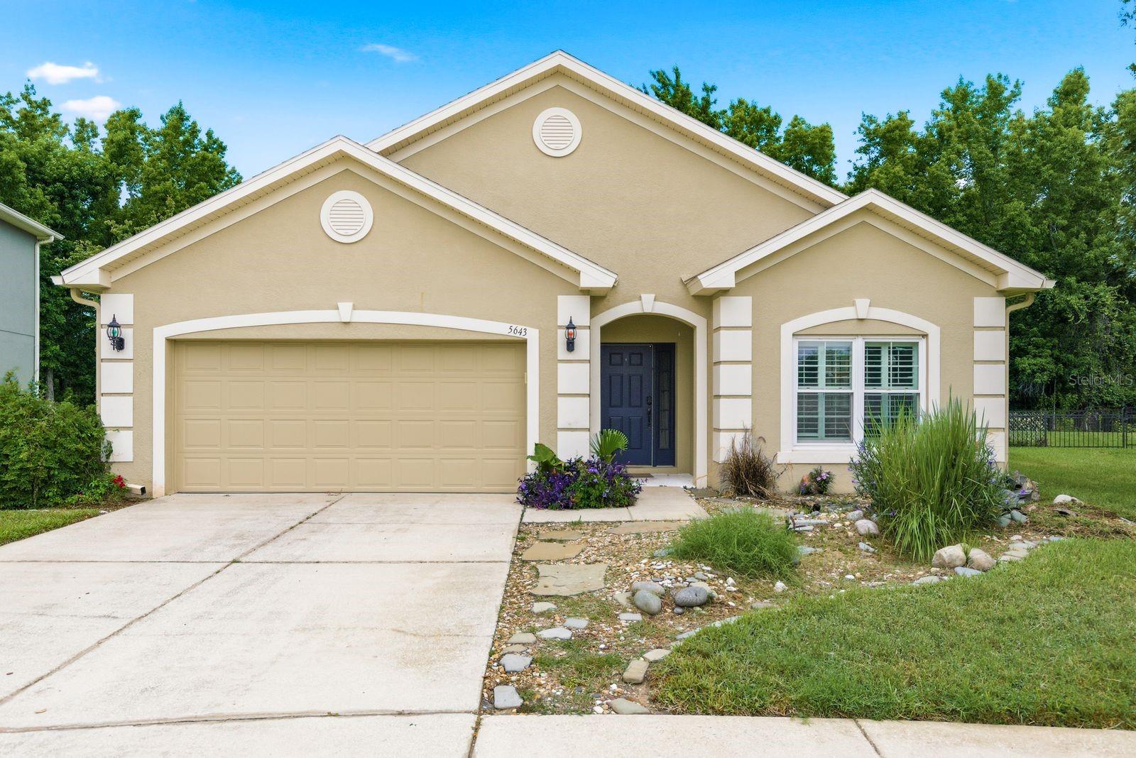 Welcome Home! This conservation lot property in Dupree Lakes is ready to be yours! Interior features: tall ceilings, propane appliances, ceramic tile, laminate vinyl plank flooring and dual-pane windows with rear triple sliding glass door. Primary bedroom has two walk in closets with twin sinks in the attached bathroom. Kitchen features granite countertops, propane gas stove, and island with deep basin sink. Exterior features a fully fenced backyard with a 24'x20 pavered patio and fire pit. Great value! Close to schools, shopping and recreation. Call today to schedule your private showing!