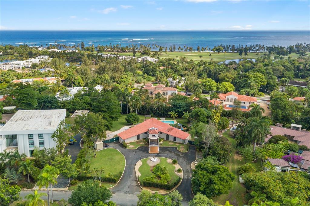 OCEAN VIEWS! Perched on top of a hill, inside the exclusive Dorado Beach Ritz-Carlton Reserve gates, this property will afford you ocean views from every floor, high above the East Beach Ritz-Carlton Residences. This trophy property features 1.25 acres of prime real estate awaiting your personal touch to build an unparalleled estate. Set inside the Dorado Beach Ritz-Carlton Reserve, directly adjacent to the East Beach Ritz-Carlton Residences, The Estates at Dorado Beach consists of 30 custom homes. Each property is set on an oversized lot offering unrivaled privacy, seclusion and flexibility. The Estates is the only community inside the resort where a custom home can be built.
 
Do not miss out on this rare opportunity to own one of a handful of expansive properties with ocean views inside the Ritz-Carlton Reserve gates. Surrounded by world-class properties valued in excess of $30MM, 9 The Estates at Dorado Beach has an original condition home with 5-bedrooms, 4 full bathrooms, 2 half-bathrooms, a renovated guest house/office/maid’s quarters, new saltwater pool and 100 Kw generator awaiting a new owner to customize this luxury estate.
 
Schematic architectural plans for a sprawling 10,000 square foot home (7 bedrooms, 8.5 baths, theater, game room, spa, expansive pool, tennis court and gym) are included. Immerse yourself in this tropical paradise centrally located within walking distance of all amenities of The Ritz-Carlton Reserve at Dorado Beach (The Ritz-Carlton Reserve Hotel at Dorado Beach, COA, Positivo, Encanto, Barlovento, Spa Botanico, Golf Clubhouse, Helicopter pad and the TPC East Golf Course) and be pampered by the amenities and premier services provided within the highly sought-after community of Dorado Beach, a Ritz-Carlton Reserve.