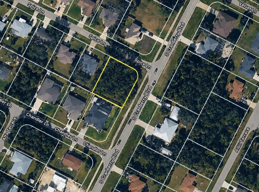 Discover the perfect location to build your Florida dream home on this desirable oversized corner lot in North Port. Situated at the intersection of Spice Lane and South Cranberry Blvd, this residential homesite offers added design flexibility, excellent accessibility, and a peaceful setting surrounded by established homes and natural Florida landscape.
Enjoy the convenience of being just minutes from shopping, restaurants, schools, golf courses, parks, and everyday amenities. Outdoor enthusiasts will appreciate the proximity to the renowned Warm Mineral Springs Park, one of Florida's most unique natural attractions, known for its year-round warm mineral waters. The property is also a short drive from Gulf Coast beaches, boating, fishing, and the new downtown Wellen Park area.
Whether you're looking to build a primary residence, vacation getaway, or investment property, this lot offers an outstanding opportunity in one of Southwest Florida's fastest-growing communities.
