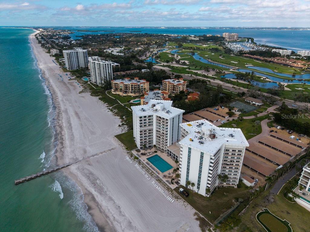 Welcome to The Islander Club — your turnkey getaway awaits! Step into coastal living with this beautifully updated residence offering effortless style and year-round relaxation. The open, sun-filled layout features tasteful luxury finishes and seamless access to a 38-foot terrace, perfect for unwinding after a day at the beach.
Unit 54S has been thoughtfully upgraded throughout, showcasing wood flooring, an updated kitchen with stainless steel appliances, refreshed bathrooms, and unique architectural details that add character and charm. The sunlit primary bedroom includes an ensuite bathroom, a large walk-in closet, and a cozy seating area ideal for reading or enjoying your morning coffee. The spacious second bedroom welcomes guests with terrace access and a generous closet for added storage.
The Islander Club’s resort-style amenities include a private 400' beachfront, heated pool, brand-new fitness center, two new sauna rooms, a  Har-Tru™ tennis court, two pickleball courts and on-site management for true lock-and-leave convenience. 
The Islander Club has recently completed an extensive series of capital improvements that elevate both the structural integrity and the everyday experience of the community. Enhancements include exterior stucco repairs and balcony waterproofing, new roofs on the carports, clubhouse, and both residential towers, and modernized pool facilities with new resurfacing, tile, and equipment. 
Additional upgrades such as refreshed landscaping and lighting, hurricane-rated windows and doors, and a fully renovated fitness center further enhance the appeal and long-term value of the property. 
Whether you’re seeking a seasonal retreat or a full-time coastal home, this move-in-ready gem delivers the best of island living and peace of mind.