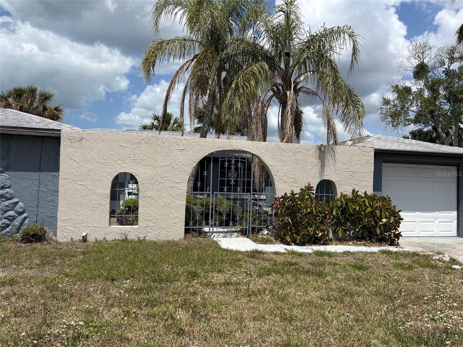 Just renovated, new cabinets and countertop kitchen. All renovated bathrooms. Nice back porch screened lanai. New HVAC.  No HOA, spacious and flexible floor plan. Move in ready.