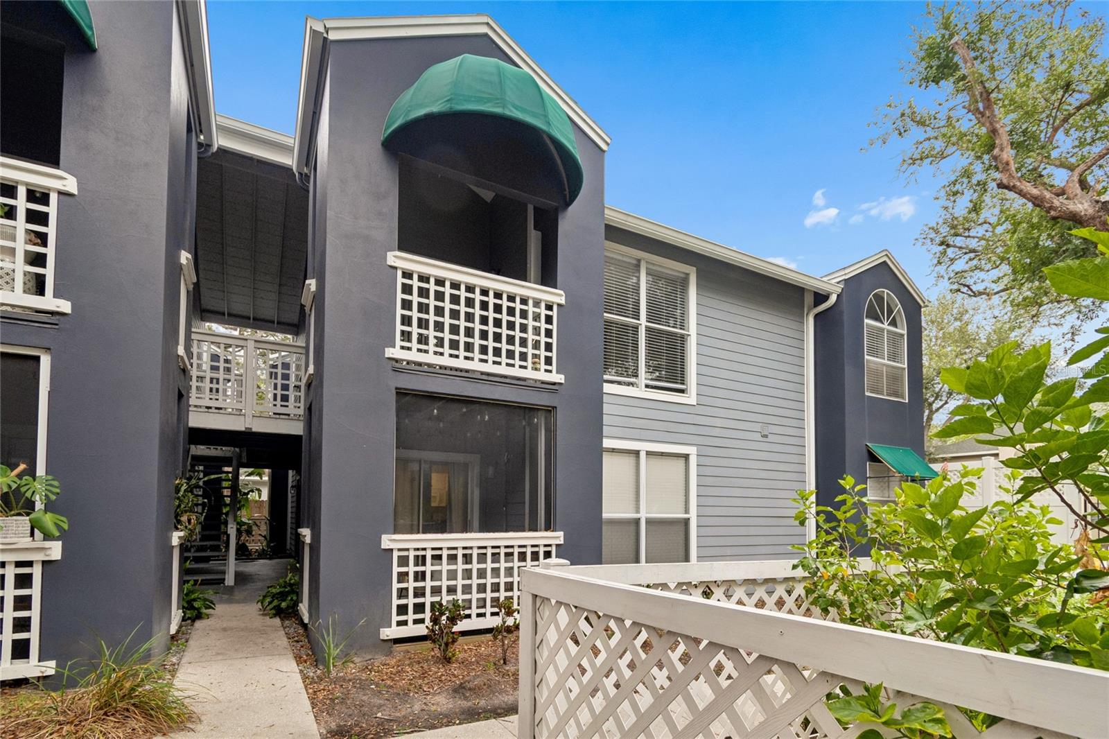 Welcome to this beautifully updated 2-bedroom, 2-bath condominium in the gated Hamilton Place II community, in the heart of South Tampa’s sought-after SoHo/Hyde Park neighborhood. This move-in-ready condo features UPGRADED BATHROOMS, FLOORING, and LAUNDRY AREA. 
The renovated entryway opens the living space, creating a bright, welcoming layout that feels spacious from the moment you walk in. Large windows fill the home with abundant natural light, enhancing the open-concept living and dining areas. Step onto your private balcony to enjoy peaceful views of the community pool, complete with a convenient exterior storage closet for added functionality.
The kitchen features stainless steel appliances and ample cabinet space, while both bathrooms have been renovated with modern finishes. Both bedrooms have vaulted ceilings, adding volume and character while creating an airy and comfortable retreat. A convenient interior linen closet located between the bedrooms provides additional storage and everyday convenience.
Additional highlights include a newer A/C unit, in-unit washer and dryer, a reserved parking space, one street parking permit and abundant storage throughout. Residents will enjoy the security of a gated community and access to a sparkling community pool downstairs, near Hyde Park Village, SoHo’s popular restaurants and nightlife, coffee shops, boutiques, and Bayshore Boulevard, with Downtown Tampa just minutes away. Close to USF Downtown campus, UT campus, interstate and the airport. Schedule your personal tour today.