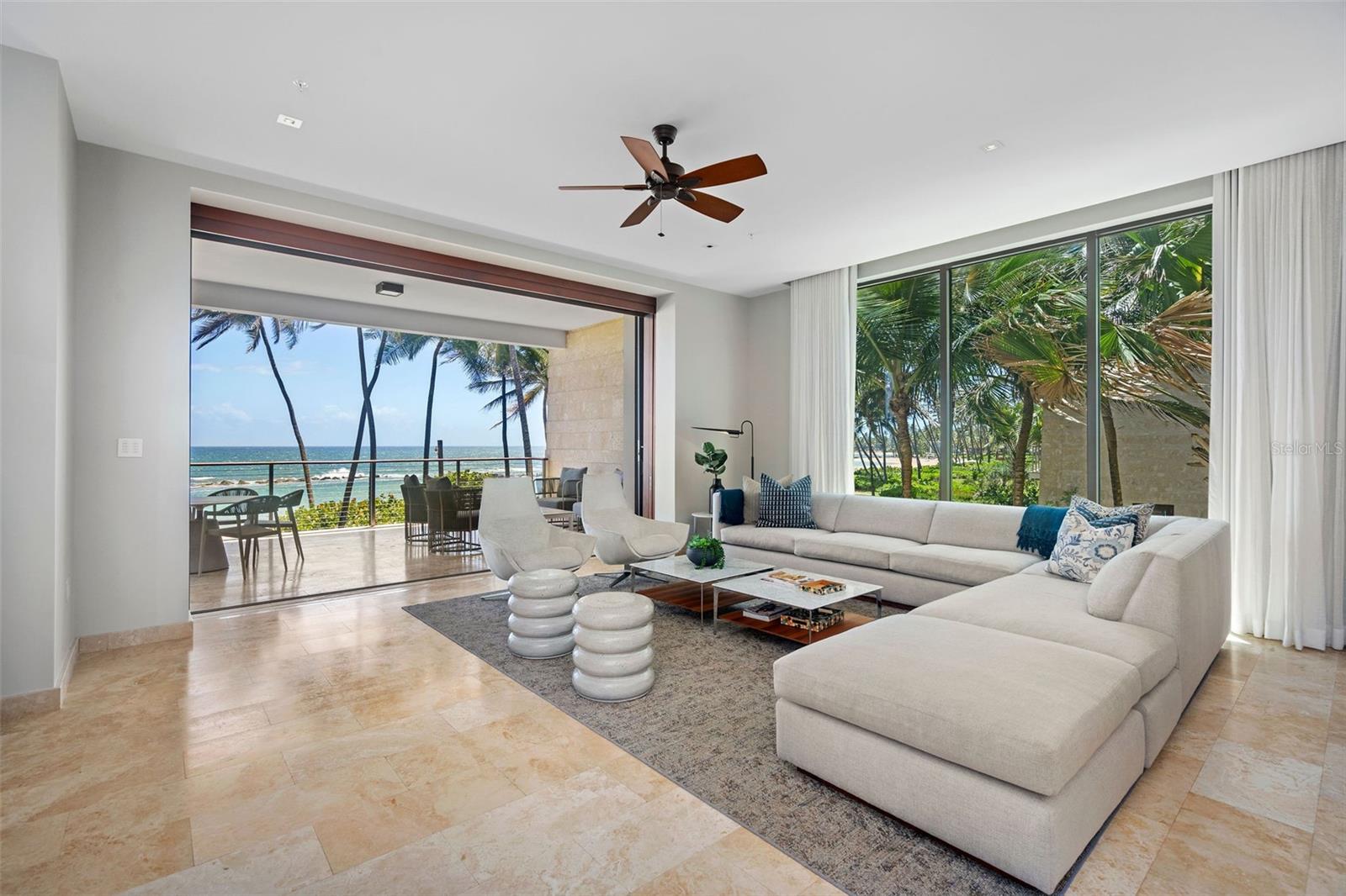 This modern high-end apartment at The West Beach Residences features 3 bedrooms, 3.5 bathrooms, a modern fully equipped kitchen, a spacious family room. The property offers a balcony and outdoor area with outside furniture great for relaxing and enjoying time with family and friends overlooking West Beach.

  West Beach condominiums are located directly on the beach first selected by Laurance Rockefeller 50 years ago as the location for the original Dorado Beach Hotel. With almost two miles of beachfront, this contemporary home offers a limited opportunity to become part of the history of Dorado Beach. These are the first waterfront homes offered at Dorado Beach, located directly on the beach chosen by Laurence S. Rockefeller, so there is no better location for experiencing your own Caribbean vacation.