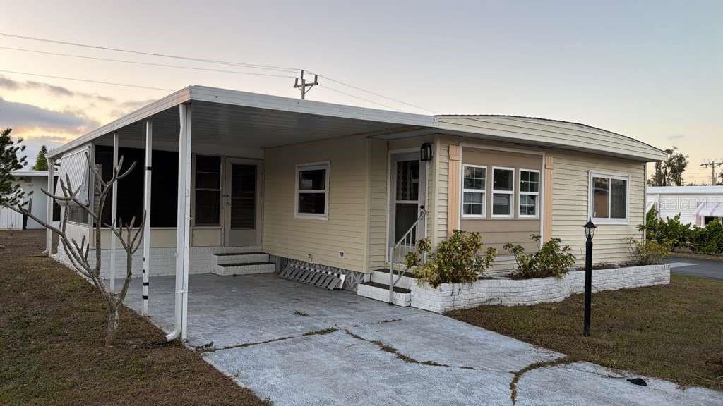 WELCOME TO THIS 55+ COMMUNITY HOME! ROOF 2025! Discover 530 Sun Up Street, North Fort Myers, FL 33917, a beautifully renovated double-wide manufactured home on owned land, located on a CORNER LOT that’s truly MOVE-IN ready and fully furnished...just bring your luggage and stay comfortably! This beautiful 2 bedroom / 2 bath home offers an inviting open living space with bright lighting, white cabinetry, stainless steel appliances, and solid, clean kitchen countertops that give the interior a fresh, modern feel. The home, built 1981, features approximately 866 sq ft of living space, plus a sun room that adds flexible bonus space for relaxing or entertaining, along with an adjusted gross area of 997 sq ft and a gross living area of 1,290 sq ft. Major updates provide peace of mind, including a roof fully fixed in 2025, working A/C and water heater, and a newly improved carport, plus a storage shed for added convenience. The property is vacant, in excellent condition, connected to public sewer, and no flood insurance is required. Located in a 55+ community where you own the land, with a low $180 monthly park fee, this home also includes titles for both sections. Conveniently located in North Fort Myers, you’re just minutes from local dining, shopping, parks, and easy access to major roadways, making daily errands and commuting a breeze. Seller financing and private financing available. Don’t wait, opportunities like this won’t last long!