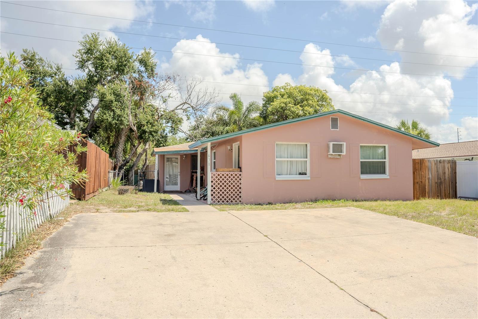 Exceptional duplex investment opportunity in one of Tampa Bay's most desirable coastal communities! Located just minutes from vibrant Downtown Dunedin, this solid block construction property sits in a non-flood zone and offers two units, each featuring 2 bedrooms, 1 bathroom, comfortable living spaces, and private entrances. Numerous updates have been completed in recent years, providing peace of mind for both owner-occupants and investors.

Whether you're looking to offset your mortgage by living in one unit while renting the other, expand your investment portfolio, or capitalize on the area's strong rental demand, this versatile property offers outstanding potential. Dunedin continues to attract residents and visitors alike with its unique blend of small-town charm, waterfront beauty, and year-round activities.

The location is a standout feature. Downtown Dunedin, less than 1 mile away, offers a lively collection of locally owned restaurants, cafés, breweries, boutiques, art galleries, and community events. Residents enjoy easy access to the Pinellas Trail, a popular multi-use trail that stretches through Pinellas County and connects numerous parks, restaurants, and entertainment destinations. The scenic Dunedin Marina and waterfront parks are just minutes away, providing beautiful sunset views and recreational opportunities along St. Joseph Sound.

Outdoor enthusiasts will appreciate being only about 5 miles from the award-winning beaches and nature trails of Honeymoon Island State Park, one of Florida's most visited state parks featuring more than four miles of Gulf-front shoreline, kayaking, fishing, hiking trails, and access to nearby Caladesi Island. Clearwater Beach is approximately 7 miles away, while the historic Sponge Docks of Tarpon Springs are within a short drive, expanding the area's appeal for both residents and visitors.

Known for its walkable downtown, waterfront parks, craft brewery scene, spring training baseball, festivals, and strong sense of community, Dunedin remains one of the Gulf Coast's most sought-after destinations. This property offers the rare combination of immediate income potential, flexible living arrangements, and an exceptional location in a thriving coastal market. Don't miss the opportunity to own a duplex in a city consistently recognized for its charm, lifestyle, and enduring appeal.