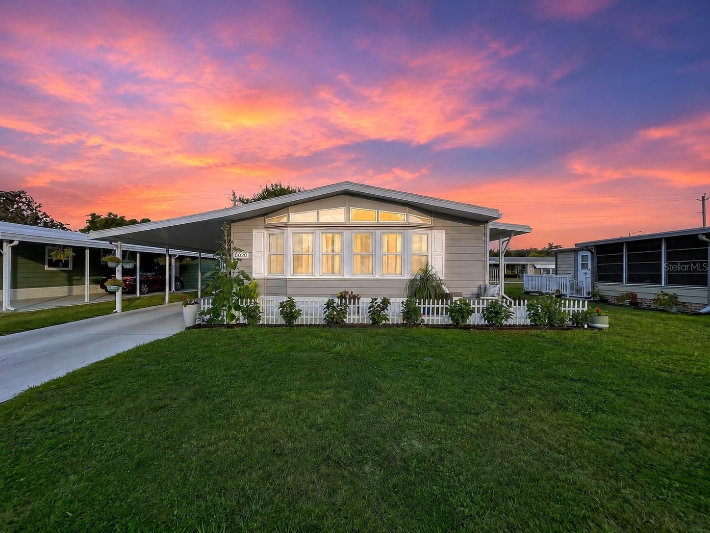 Welcome to easy Florida living in the highly desirable 55+ community of Foxwood Lake Estates in North Lakeland! This beautifully maintained 2-bedroom, 2-bath home offers 1,456 square feet of comfortable living space designed for both relaxation and entertaining.

Step inside to discover a bright and inviting floor plan filled with natural light. The spacious living and dining areas flow seamlessly together, creating an open atmosphere perfect for everyday living and hosting friends and family. The well-appointed kitchen provides abundant cabinet and counter space, making meal preparation both convenient and enjoyable.

Pride of ownership shines throughout this home. The sellers have thoughtfully customized and updated the property with stainless steel appliances, a smart thermostat, beautiful flooring, a functional and beautiful coffee nook and newer windows that enhance both comfort and efficiency. Beyond the cosmetic improvements, the home's major systems have been meticulously maintained, providing peace of mind for the next owner. Every detail reflects a commitment to care and upkeep, creating a move-in-ready opportunity where you can simply unpack and begin enjoying the Florida lifestyle.

The generous primary suite serves as a private retreat, featuring ample closet space and an en-suite bath. A comfortable secondary bedroom and additional full bathroom gives flexibility for guests, hobbies, or a home office. Throughout the home, you'll appreciate the exceptional storage and functional layout that make daily life effortless.

Outside, enjoy a peaceful ambiance with room to relax, garden, or simply soak up Florida's beautiful weather. Whether you're enjoying your morning coffee or unwinding at the end of the day, the outdoor space provides the perfect setting.

Located in the sought-after Foxwood Lake Estates community, residents enjoy an active lifestyle with access to outstanding amenities, social activities, and a welcoming neighborhood atmosphere. Conveniently situated near shopping, dining, healthcare facilities, and major roadways including US-98 and I-4, this location offers easy access to both Tampa and Orlando while maintaining the charm and convenience of Lakeland living.

Lakeland is known for its picturesque lakes, parks, walking trails, vibrant downtown district, and year-round recreational opportunities. From Bonnet Springs Park to Lake Hollingsworth, you'll find countless ways to enjoy the Central Florida lifestyle.

Whether you're looking for a full-time residence or a seasonal retreat, this move-in ready home offers the perfect combination of comfort, convenience, and community. Don't miss your opportunity to enjoy maintenance-friendly living in one of Lakeland's most established and desirable 55+ neighborhoods.