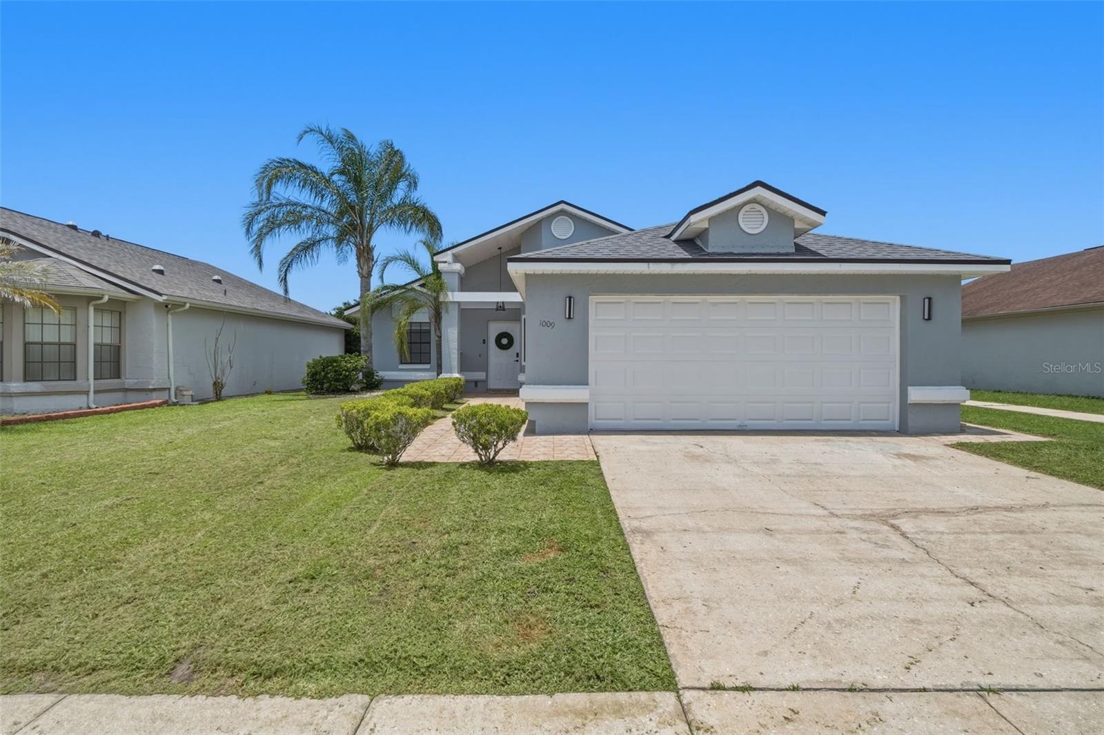 Welcome to this beautifully updated home in the desirable Bermuda Bay community. Offering 2 bedrooms, 2 bathrooms, and an open, light-filled floor plan with soaring vaulted ceilings, this move-in ready home perfectly blends comfort, style, and convenience.

The spacious living area flows effortlessly into the updated kitchen, featuring refreshed cabinetry, granite countertops, stainless steel appliances, a modern tile backsplash, breakfast bar, and contemporary lighting. Throughout the home you'll find ceramic tile flooring, fresh exterior paint completed in 2025, and tasteful finishes that create a clean, modern feel.

The primary suite offers peaceful water views and features custom closets, an updated dual sink vanity, and a spacious walk-in shower. The guest bathroom was completely renovated in 2024, providing an equally impressive space for family and visitors. Additional improvements include a new water heater installed in 2022. 

One of the home's standout features is the oversized screened lanai overlooking the tranquil pond, creating the perfect setting to enjoy your morning coffee, unwind after a long day, or entertain family and friends year-round. The backyard also features a relaxing spa and beautiful water views that create a peaceful outdoor retreat.

Conveniently located just minutes from The Loop shopping, dining, entertainment, major highways, Osceola Parkway, SR 417, Florida's Turnpike, Downtown Kissimmee, Orlando International Airport, Walt Disney World, and Central Florida's world-famous attractions, this home offers exceptional convenience for everyday living.

Whether you're searching for your first home, looking to downsize, or simply want a beautifully maintained property in a fantastic location, this Bermuda Bay gem is ready to welcome you home.