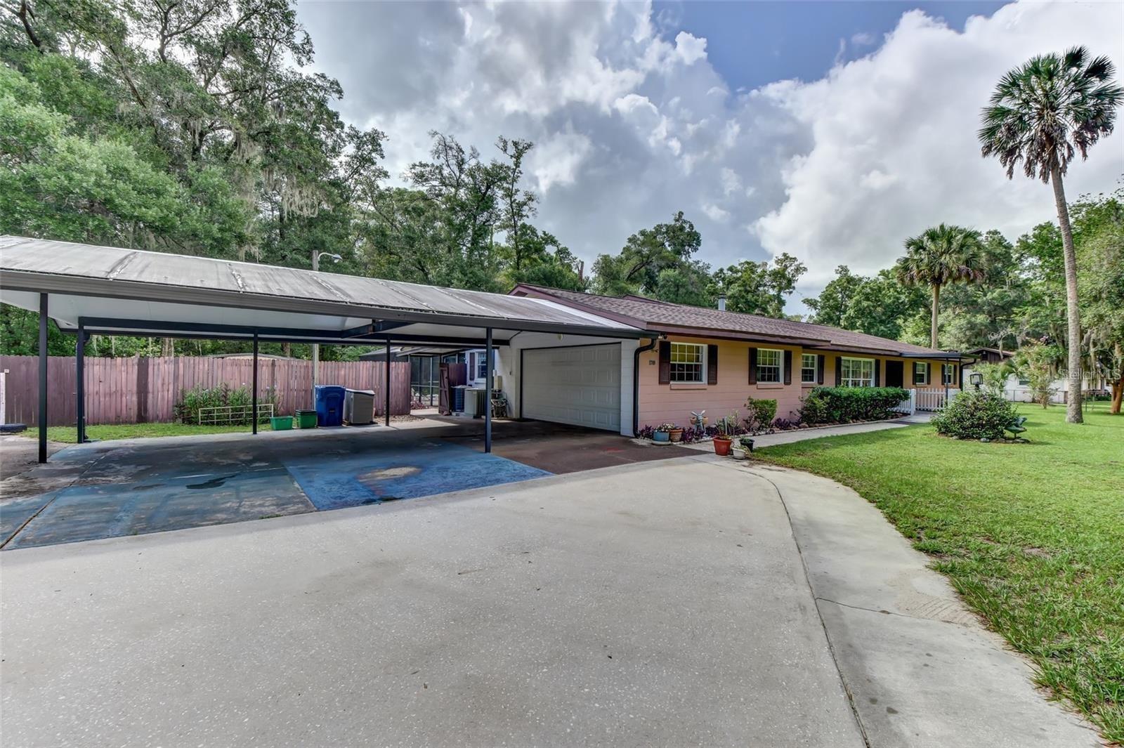 Are you searching for a haven off the beaten path? A little bit of land, not too much to maintain but enough to give you peace and privacy? This beautiful property filled with gorgeous trees is located on North Stone Street. Just a little over an acre, most fenced. NO HOA! Enjoy the peace and quiet and sound of chattering birds while sitting by your Covered patio are and screened salt water pool. Well maintained sturdy block home with split plan which features a 2nd Master Suite with its own bath, and large walk in closet, Perfect for your In-law or guest. This home has a Great room large enough for a pool table and plenty of space for entertaining right off the pool area. Roof was put on 2020. Thermo window throughout most of the house. 2 AC units. Solar Hot Water Heater. Total of 4 bedroom and an office area. 2 Car Garage and a carport for 3 cars. Easy access to International Speedway with lots of shopping. Buyer to verify all measurements.