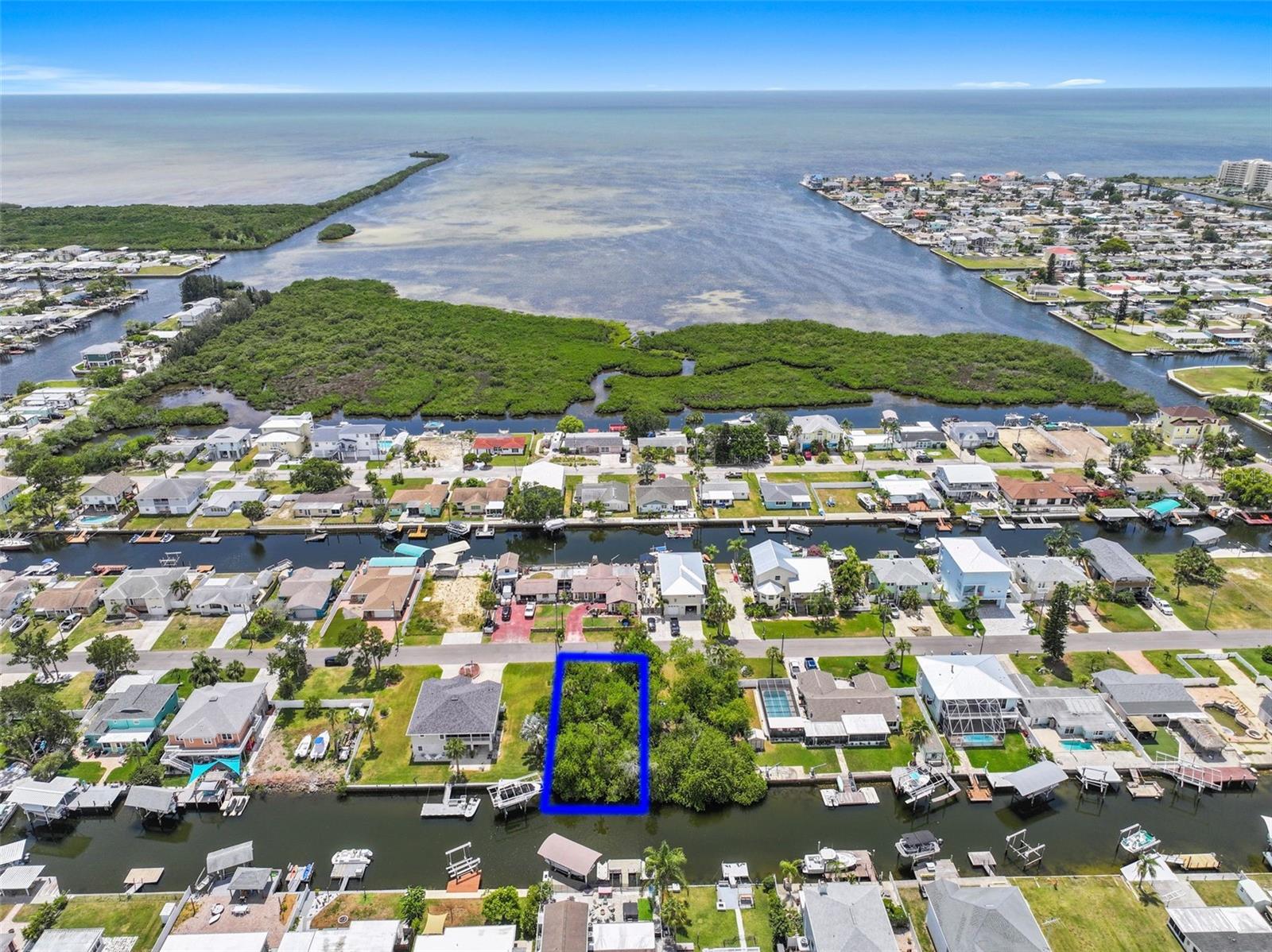 Build Your Dream Gulf Coast Boating Retreat – Direct Gulf Access Building Lot!

Discover the perfect place to build your dream waterfront home on this exceptional 59' x 100' residential building lot offering direct Gulf access with no fixed bridges and the potential for partial Gulf views. Whether you're planning a custom coastal retreat, vacation home, or waterfront investment, this property delivers the boating lifestyle you've been searching for.

An incredible bonus is that the adjoining lot is also available for purchase by the same owner at the same price, giving you the rare opportunity to own both properties and create an oversized waterfront estate or build two homes side by side for family, friends, or investment purposes.

With 59 feet of saltwater canal frontage, you'll enjoy quick, unrestricted access to the Gulf of Mexico. Spend your days fishing right from your backyard for redfish, snook, snapper, and trout, or watch dolphins and manatees cruise past your future dock as the sun sets over Florida's Nature Coast.

Welcome to Hudson Beach, one of Florida's hidden gems where boating is more than a hobby—it's a way of life. This laid-back waterfront community captures the charm of old Florida with its working shrimp boats, marinas, waterfront tiki bars, seafood restaurants, and spectacular Gulf sunsets. Launch the boat in minutes and spend the day island hopping, fishing, scalloping, or cruising the coastline.

Popular boating destinations are all within easy reach. Cruise approximately 30 minutes south to Anclote Key Sandbar, where boaters gather to enjoy crystal-clear water, beautiful shells, and endless stretches of sand. Continue a few more minutes to Anclote Key Preserve State Park, an undeveloped barrier island known for its pristine beaches and natural beauty.

Head north and explore the famous Hernando Beach Flats, a family-friendly sandbar perfect for anchoring and socializing. Continue your adventure to the Weeki Wachee, Homosassa, and Crystal River areas, where you'll discover waterfront restaurants, spring-fed rivers, and crystal-clear 74-degree springs ideal for swimming, kayaking, paddleboarding, and relaxing after a day on the Gulf.

Despite its peaceful coastal atmosphere, Hudson Beach is conveniently located just minutes from US-19, providing easy access to shopping, restaurants, grocery stores, medical facilities, marinas, and everyday conveniences. Tampa International Airport is approximately one hour away, while Orlando's world-famous attractions are only about 90 minutes from home.

Whether you purchase this lot alone or combine it with the neighboring parcel to create an extraordinary waterfront homesite, this is a rare opportunity to build the custom home you've always envisioned in one of Florida's most boating-friendly communities.

Bring your builder, your boat, and your dreams—this is the perfect place to build your own Gulf Coast Fishing Home!