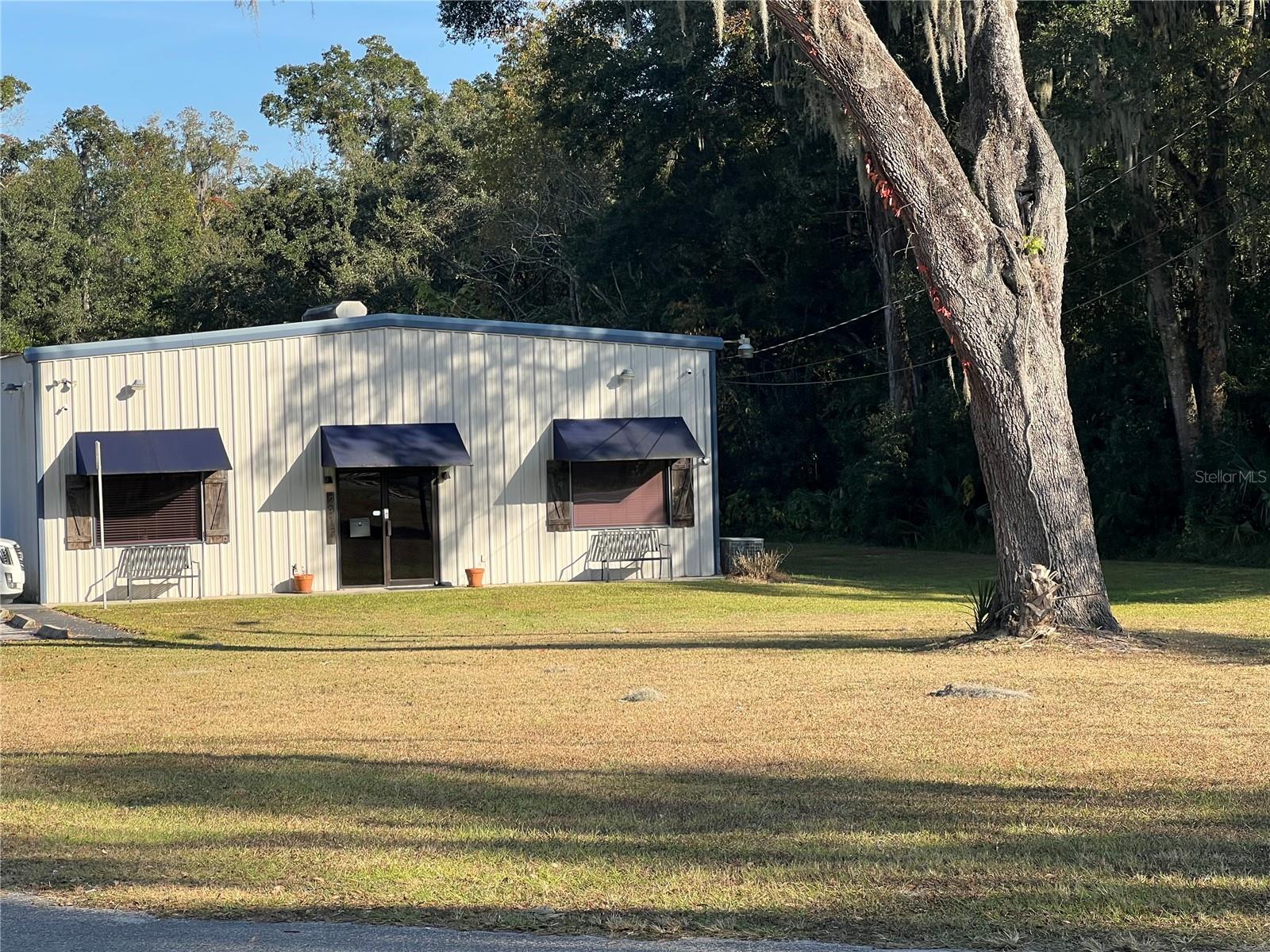This property consists of a versatile +3000 square foot warehouse with 3 offices and a sizeable meeting/conference room and a breakroom. The warehouse area is partially climate controlled with roll up bay doors and it sits on 1.21 acres of land.