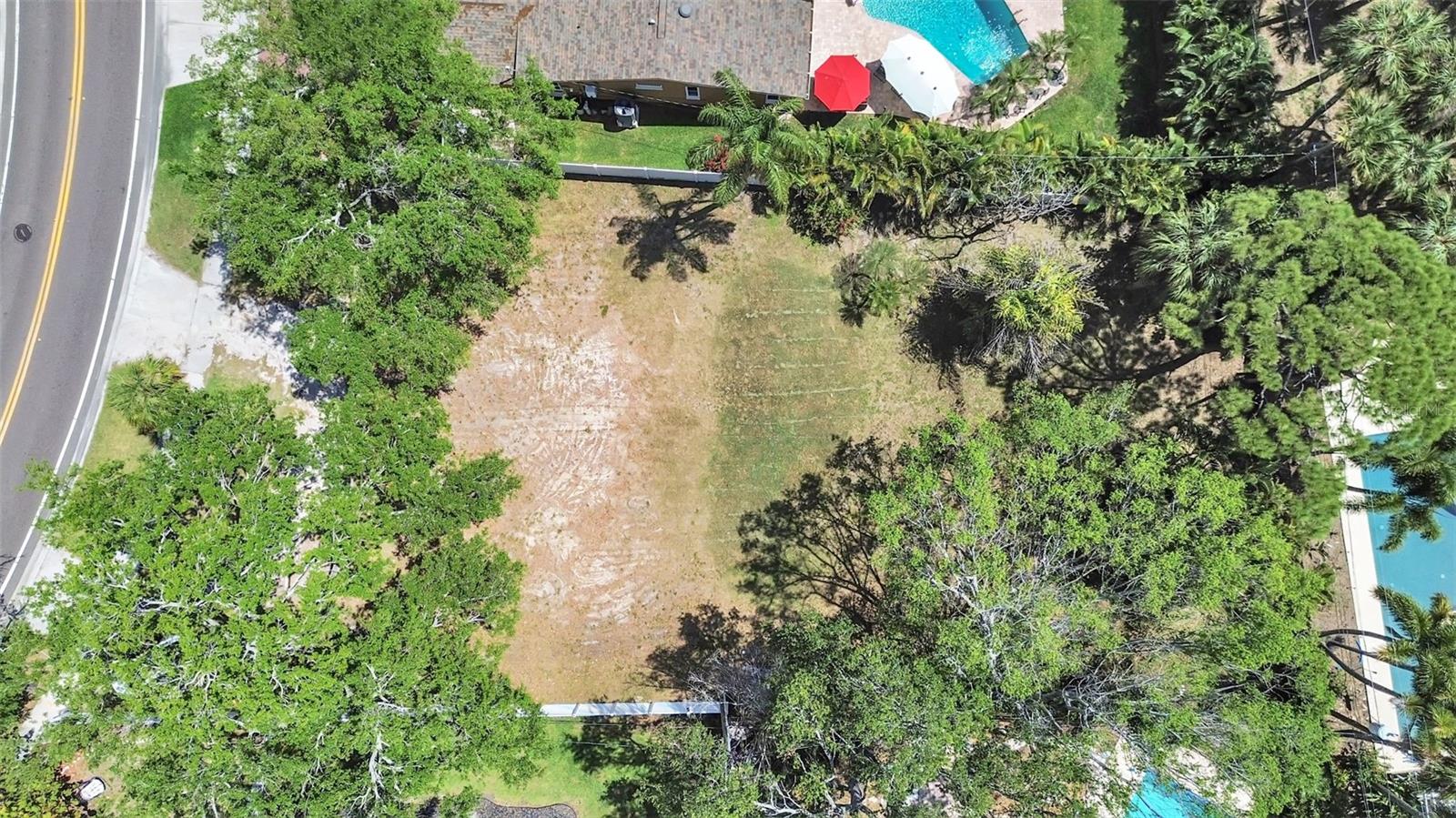 Build your dream home on this massive 0.36-acre (approx. 15,900+ sq ft) lot in one of St. Petersburg’s most desirable, high-value neighborhoods. This is a rare, spacious, cleared residential lot ready for construction, nestled among mature trees and stunning, high-end homes.
Property Highlights:
• Size: Generous 0.36573 acres—plenty of room for a large custom home, pool, and expansive outdoor living space.
• Location: Situated on the prestigious Bayou Grande Blvd NE, surrounded by luxury homes and scenic water views of the Mangrove Bayou/Tampa Bay area.
• Lifestyle: Enjoy tranquil surroundings with the convenience of city life. Minutes from vibrant downtown St. Pete, popular restaurants, shops, and marina.
• Recreation: Nearby access to Shore Acres Park and public boat ramps to Tampa Bay.
• Utilities: Public Water/Sewer available in area.
Top-Rated Schools:
Located within the prestigious Pinellas County School District, this lot is zoned for:
• Shore Acres Elementary School (Highly sought-after)
• Meadowlawn Middle School
• Northeast High School
• Close proximity to top-tier private schooling options, including Shorecrest Preparatory School.
Perfect for Builders & Dream Home Owners:
Why settle for a small lot? This is the perfect canvas for your custom home design in a rapidly appreciating area of Saint Petersburg.