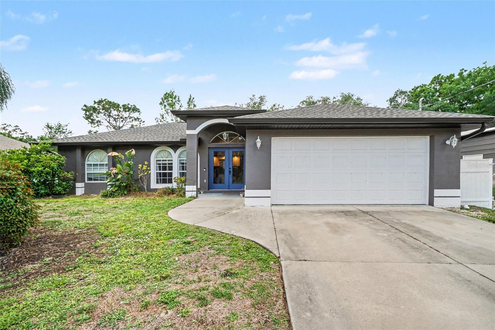 Welcome to your private North Port retreat — where space, flexibility, and comfort come together beautifully. Situated on an oversized double lot in a quiet, peaceful neighborhood, this 3-bedroom, 2-bath home offers room to grow, create, and truly enjoy Florida living. Whether you're raising a family, running a home-based business, or simply craving extra space, this property delivers.
One of the standout features is the impressive warehouse with a built-in workshop — ideal for hobbyists, entrepreneurs, or anyone needing serious storage. The rear half of the warehouse has been thoughtfully built out into private living quarters complete with a full kitchen, living room, bedroom space, full bathroom, and a spacious walk-in closet. Fully connected to septic, water, electricity, and WiFi, it also features two mini-split AC systems for year-round comfort. Perfect for guests, extended family, rental potential, or a private office retreat.
Step outside and enjoy your own backyard oasis featuring an above-ground pool with a full pool system, an RV hookup, and serene views along an irrigation canal. The expansive lot offers endless possibilities — gardens, play areas, additional storage, or simply open space to breathe. Major updates provide peace of mind, including a 4-year-old roof, 5-year-old AC system, 5-year-old water heater, and new gutters installed just 2 years ago. Tucked away in a tranquil North Port neighborhood yet conveniently located near everyday amenities, this property offers the rare combination of privacy, versatility, and functionality. This isn’t just a home — it’s a lifestyle opportunity with room for everything and everyone.Discounted rate options and no lender fee future refinancing may be available for qualified buyers of this home.